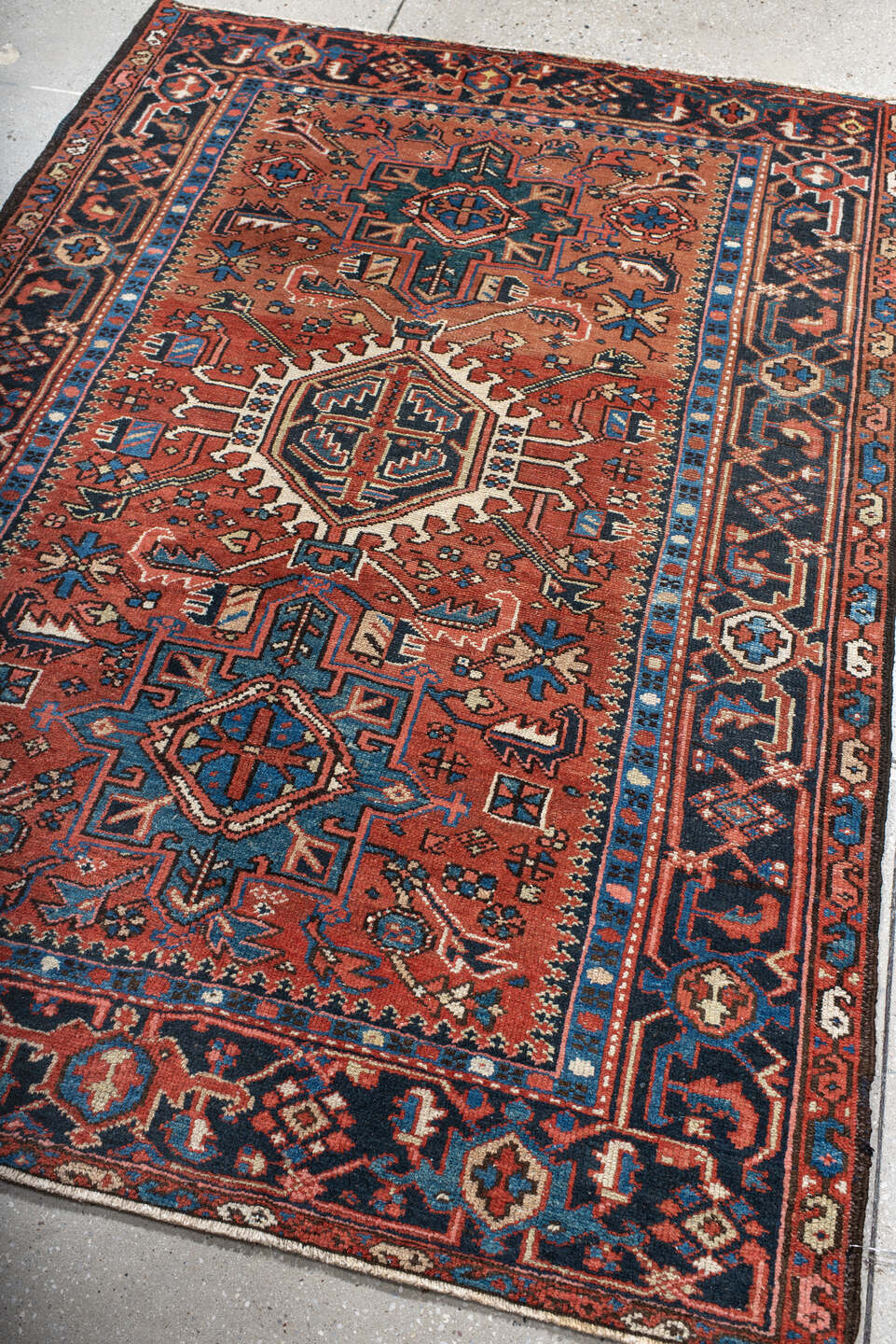 4' x 6' one-of-a-kind handmade antique Karaje small size rug. Color palette: rust, navy, sky_blue, ivory, terracotta