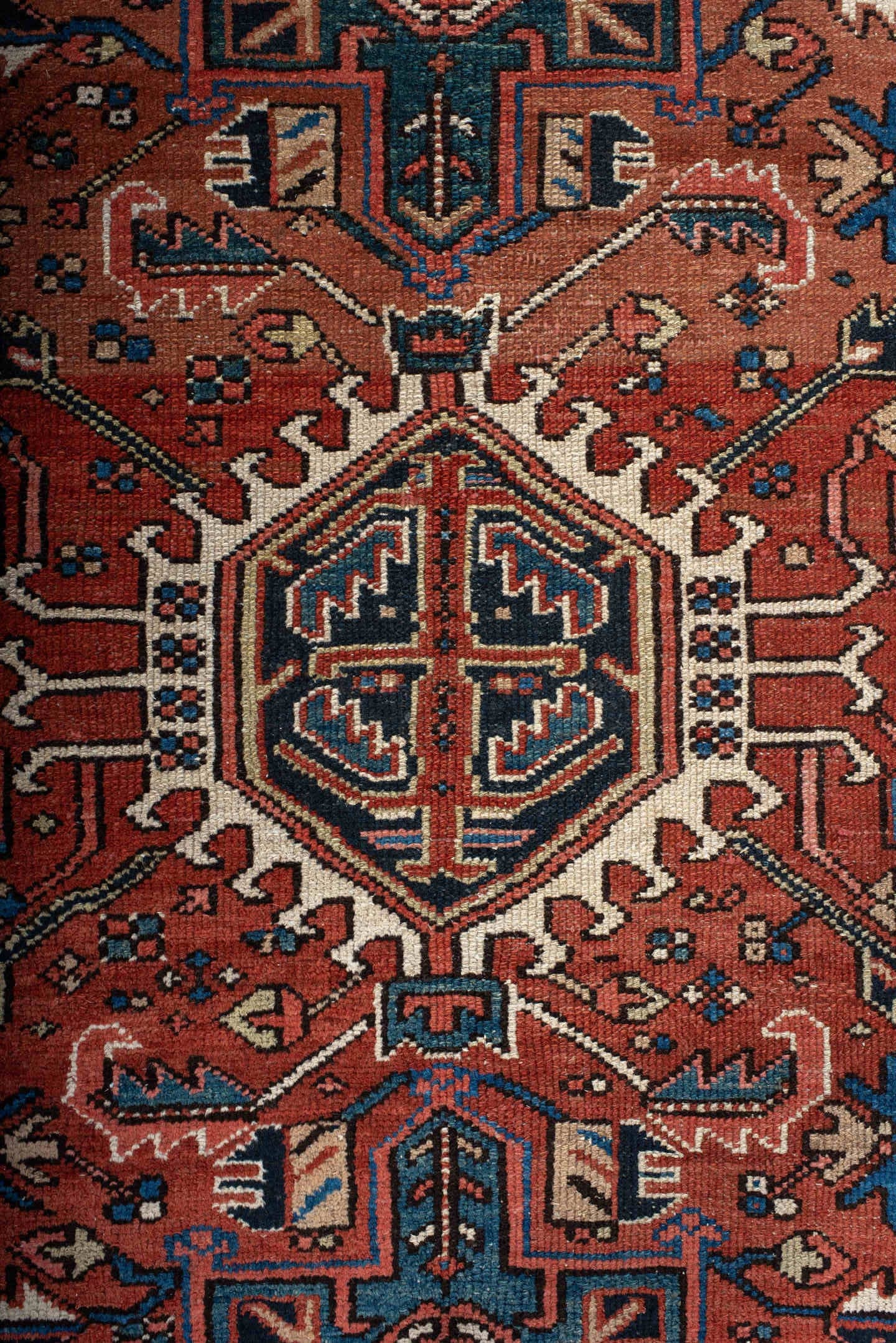 4' x 6' one-of-a-kind handmade antique Karaje small size rug. Color palette: rust, navy, sky_blue, ivory, terracotta