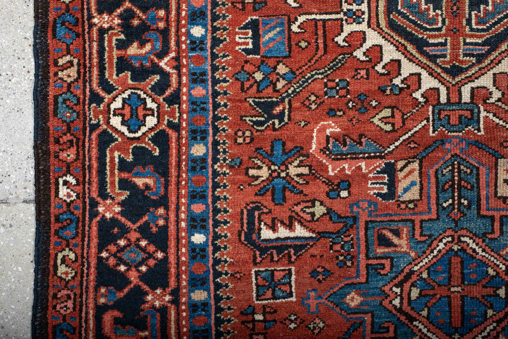 4' x 6' one-of-a-kind handmade antique Karaje small size rug. Color palette: rust, navy, sky_blue, ivory, terracotta