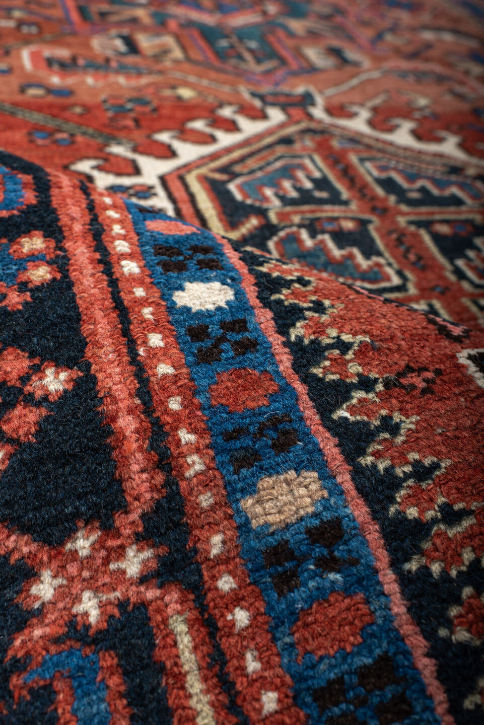 4' x 6' one-of-a-kind handmade antique Karaje small size rug. Color palette: rust, navy, sky_blue, ivory, terracotta
