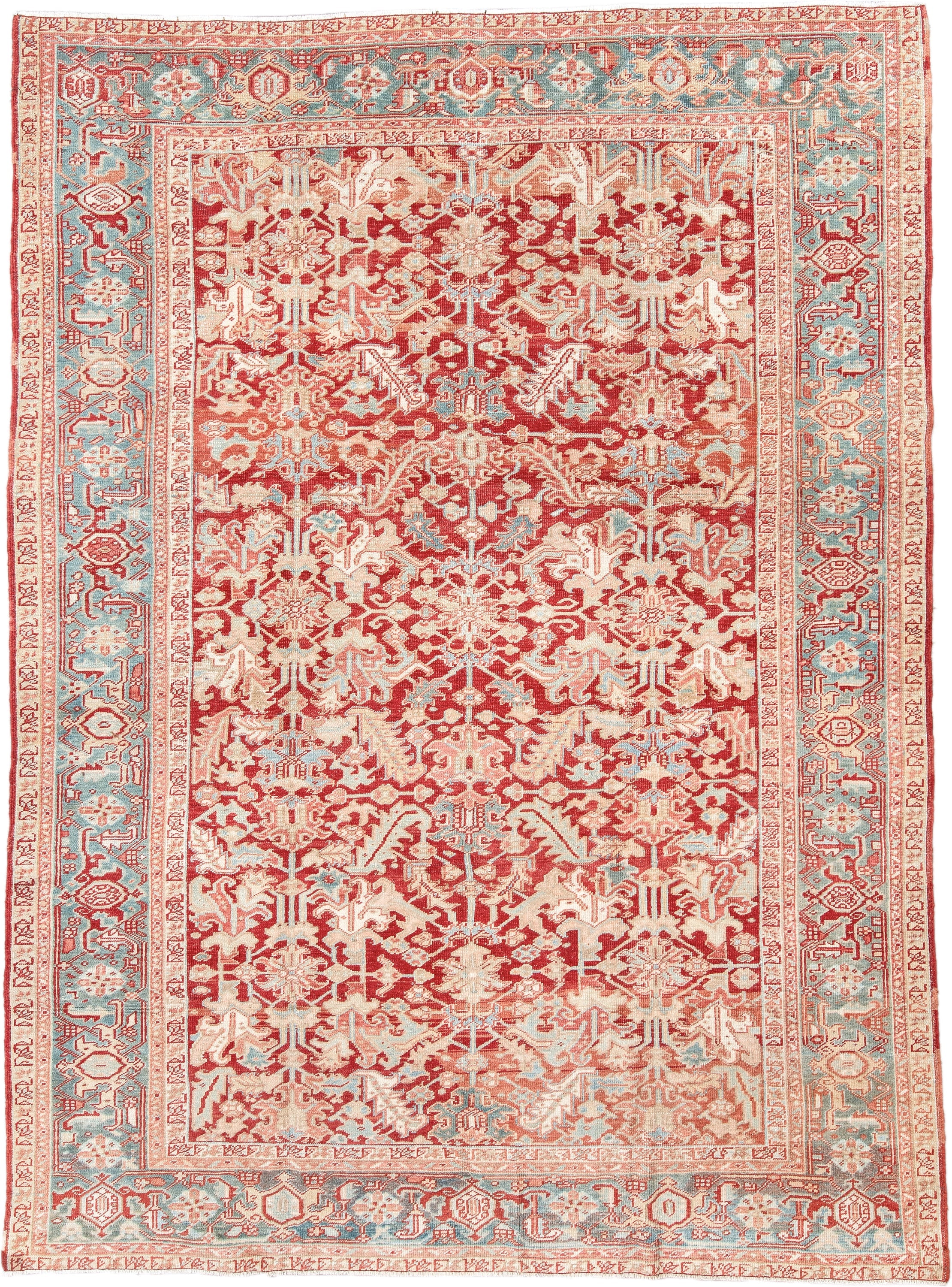 7' x 10' one-of-a-kind handmade antique Heriz large size rug. Color palette: rust, ivory, sky blue, coral, brick, cream