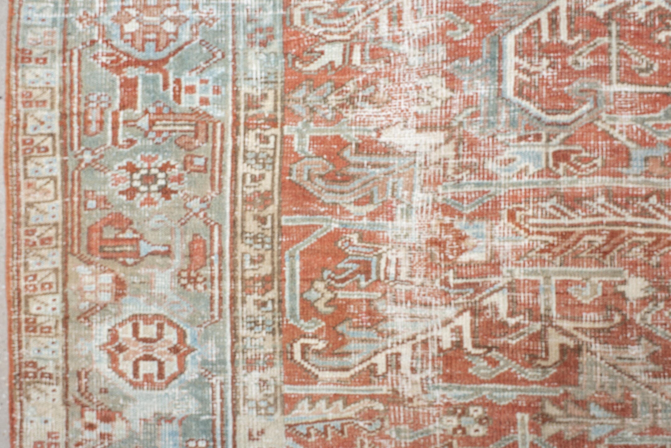 7' x 10' one-of-a-kind handmade vintage Heriz large size rug. Color palette: ivory, terra cotta, pale blue, sage, taupe