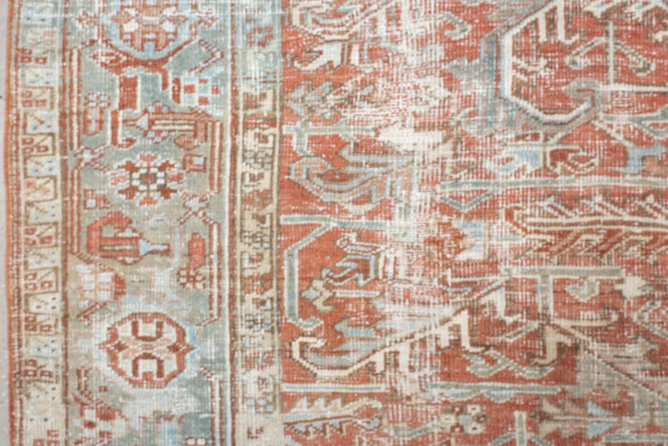 7' x 10' one-of-a-kind handmade vintage Heriz large size rug. Color palette: ivory, terra cotta, pale blue, sage, taupe