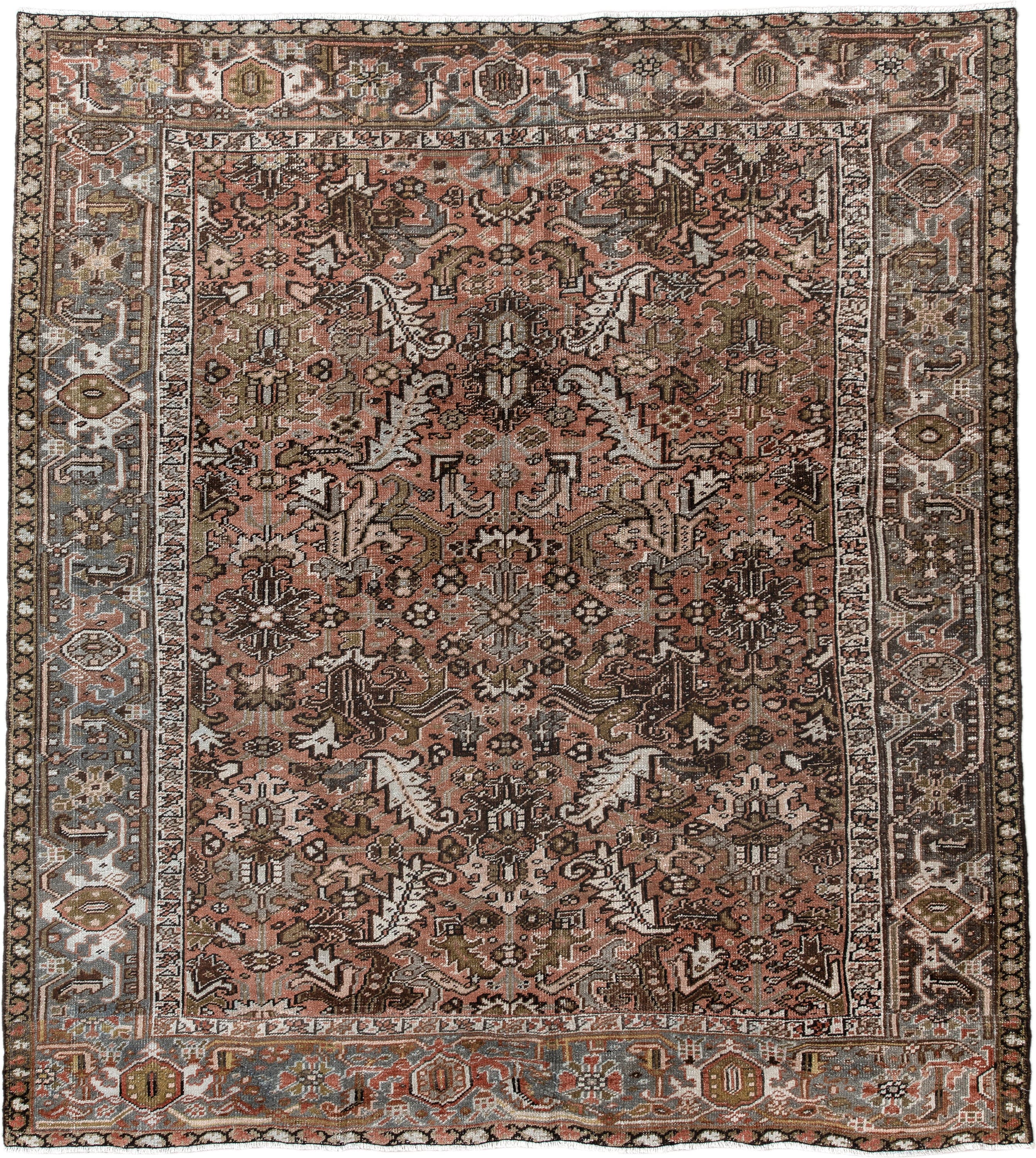 7' x 8' one-of-a-kind handmade antique Heriz rug. Color palette: terra cotta, slate, ivory, taupe, charcoal, olive, rust