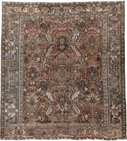 7' x 8' one-of-a-kind handmade antique Heriz rug. Color palette: terra cotta, slate, ivory, taupe, charcoal, olive, rust