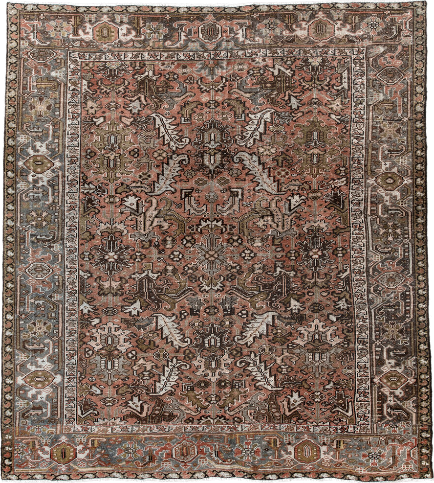 7' x 8' one-of-a-kind handmade antique Heriz rug. Color palette: terra cotta, slate, ivory, taupe, charcoal, olive, rust