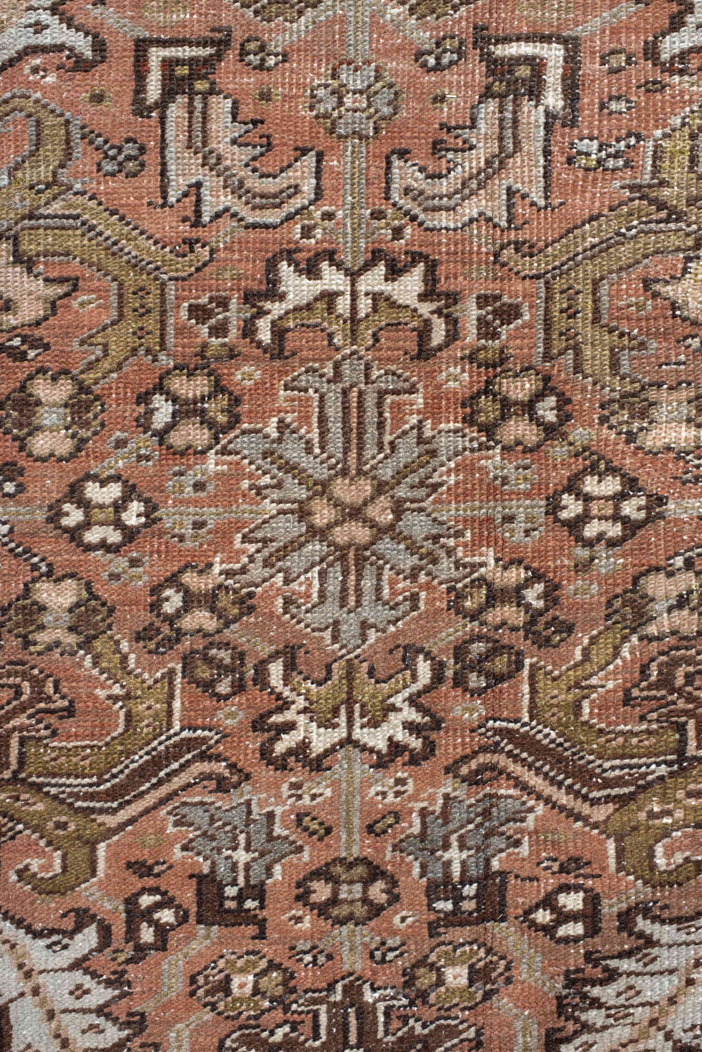 7' x 8' one-of-a-kind handmade antique Heriz rug. Color palette: terra cotta, slate, ivory, taupe, charcoal, olive, rust