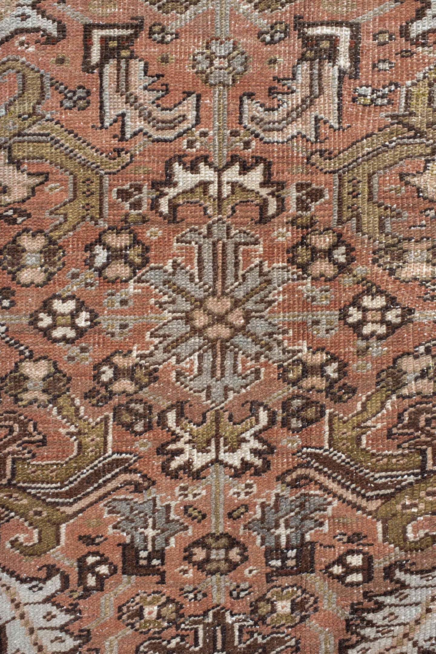 7' x 8' one-of-a-kind handmade antique Heriz rug. Color palette: terra cotta, slate, ivory, taupe, charcoal, olive, rust