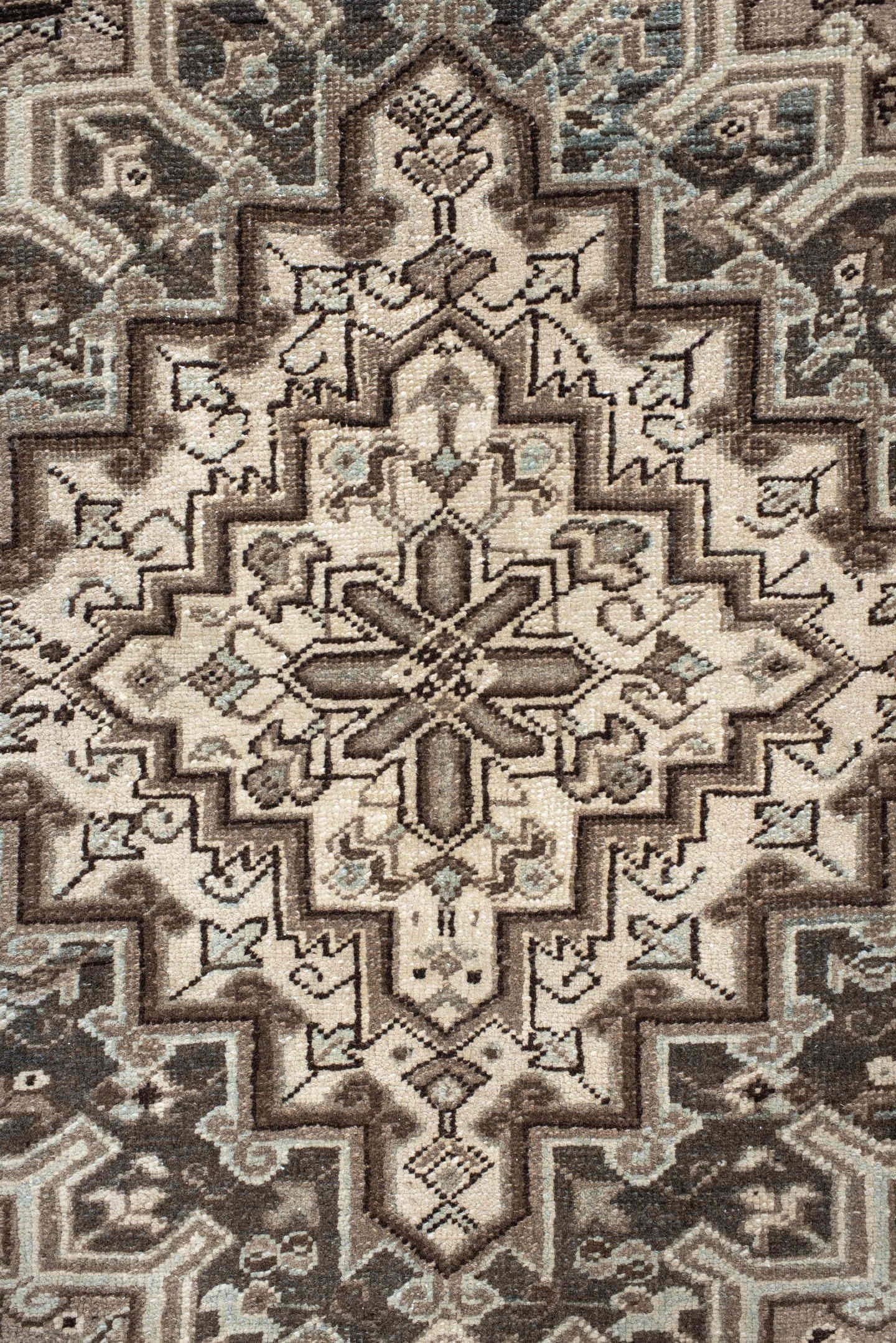 7' x 11' one-of-a-kind handmade antique Heriz large size rug. Color palette: taupe, brown, ivory, charcoal, pale blue, camel