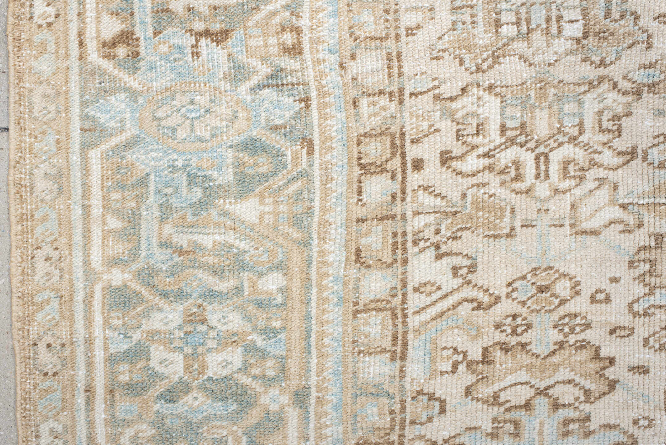 7' x 8' one-of-a-kind handmade antique Heriz rug. Color palette: ivory, taupe, pale blue, sand, beige, camel, gray