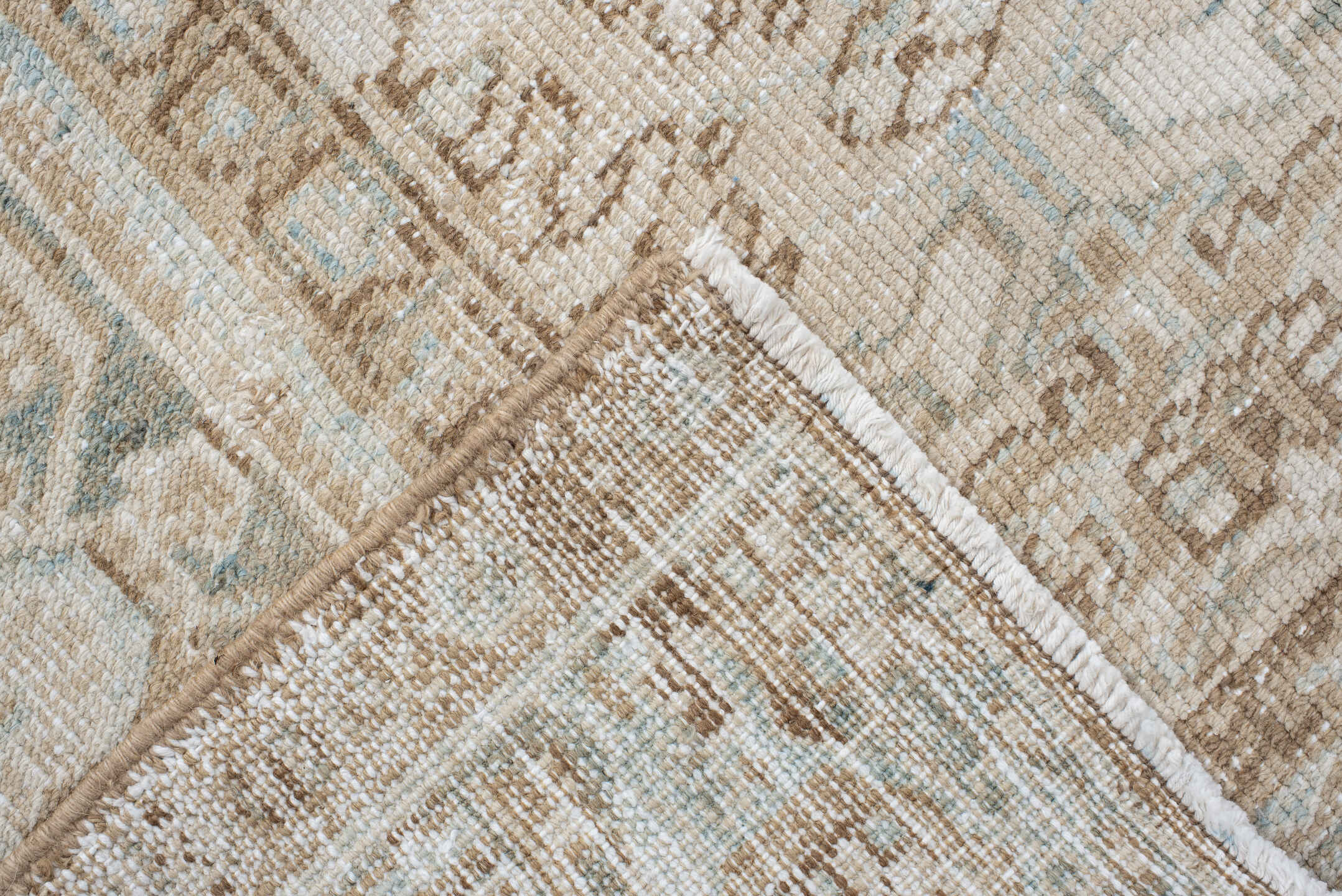 7' x 8' one-of-a-kind handmade antique Heriz rug. Color palette: ivory, taupe, pale blue, sand, beige, camel, gray