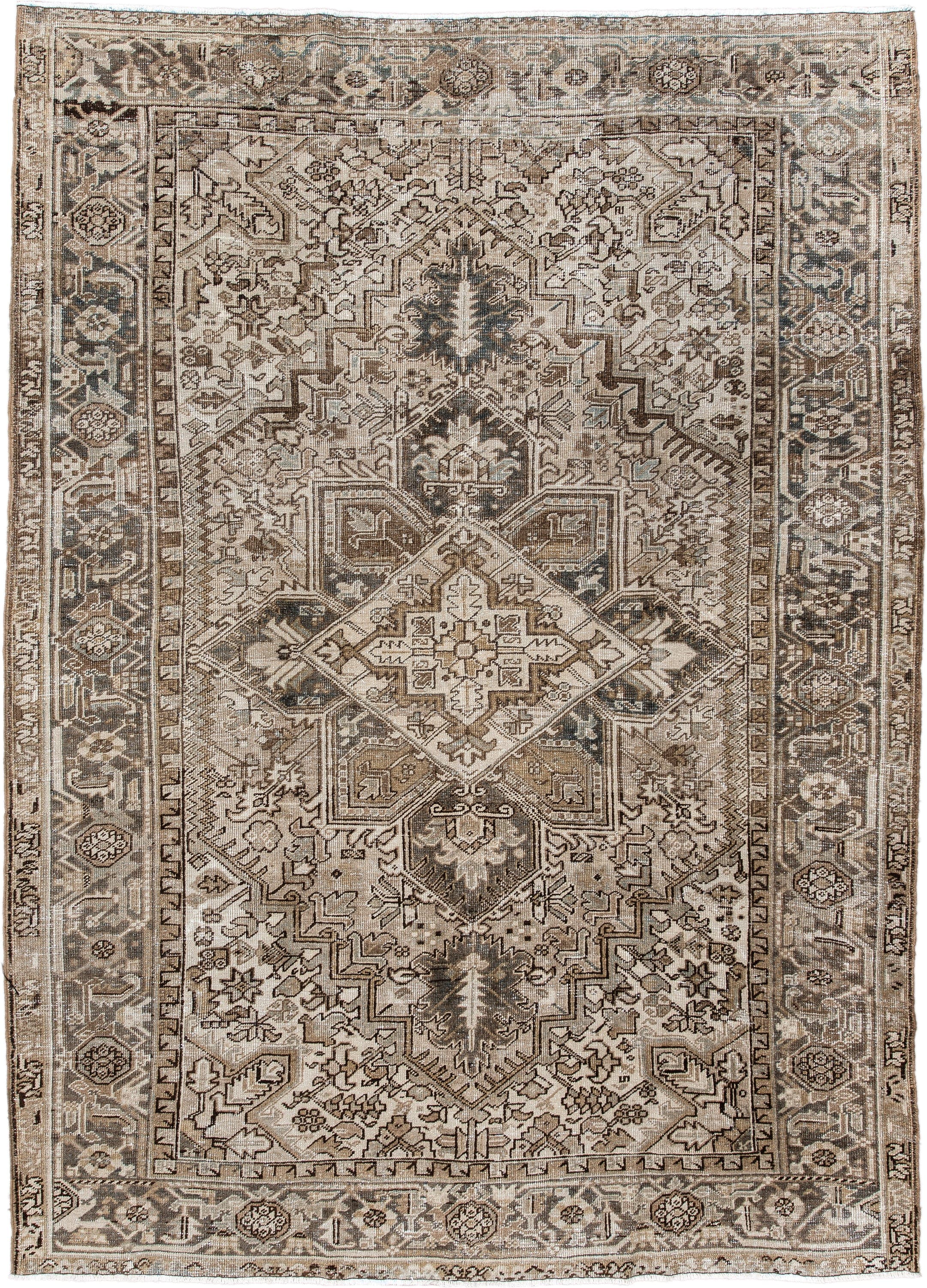 6' x 9' one-of-a-kind handmade antique Heriz rug. Color palette: ivory, taupe, camel, charcoal, brown, sage, beige, gray