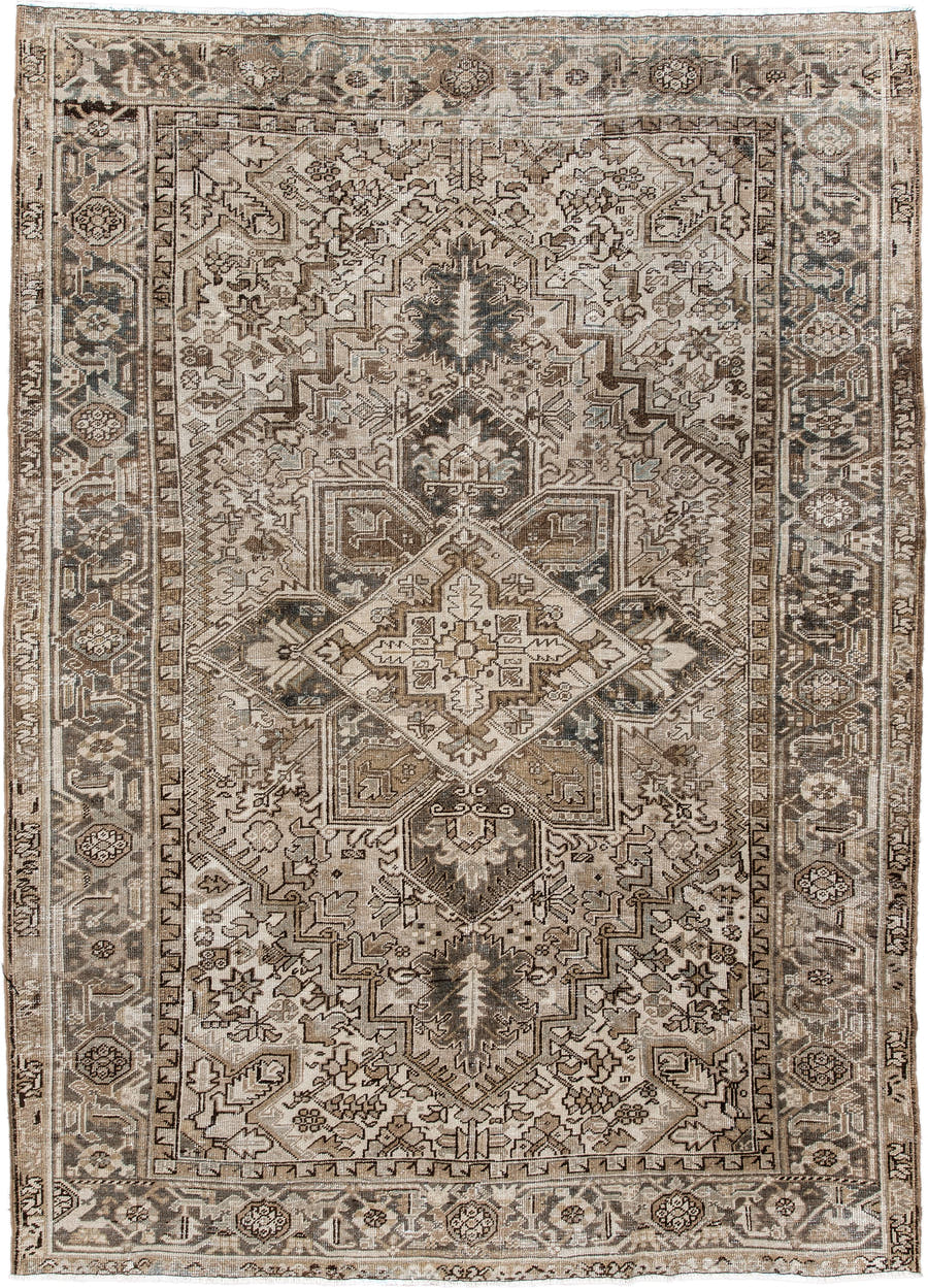 6' x 9' one-of-a-kind handmade antique Heriz rug. Color palette: ivory, taupe, camel, charcoal, brown, sage, beige, gray