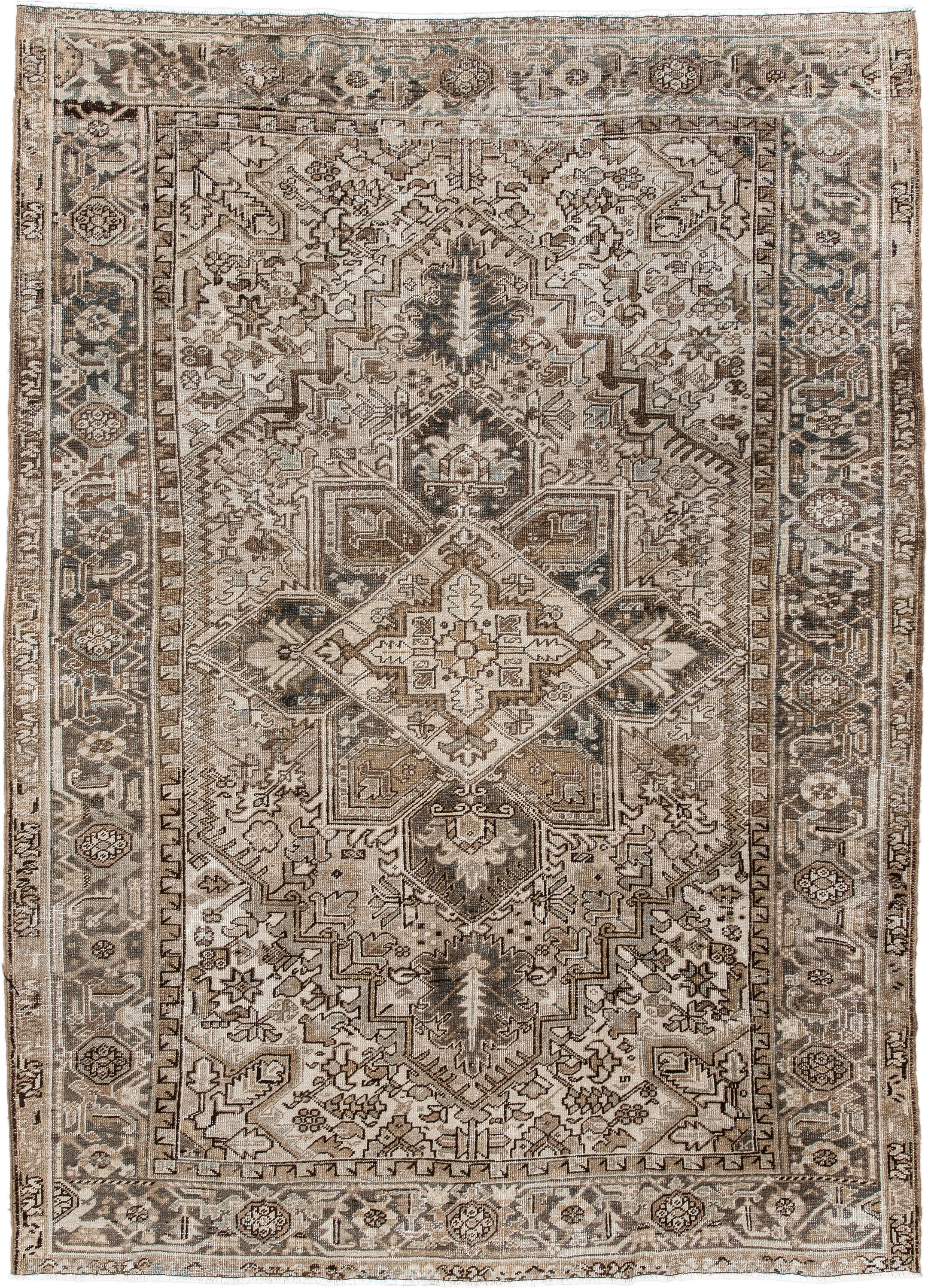 6' x 9' one-of-a-kind handmade antique Heriz rug. Color palette: ivory, taupe, camel, charcoal, brown, sage, beige, gray