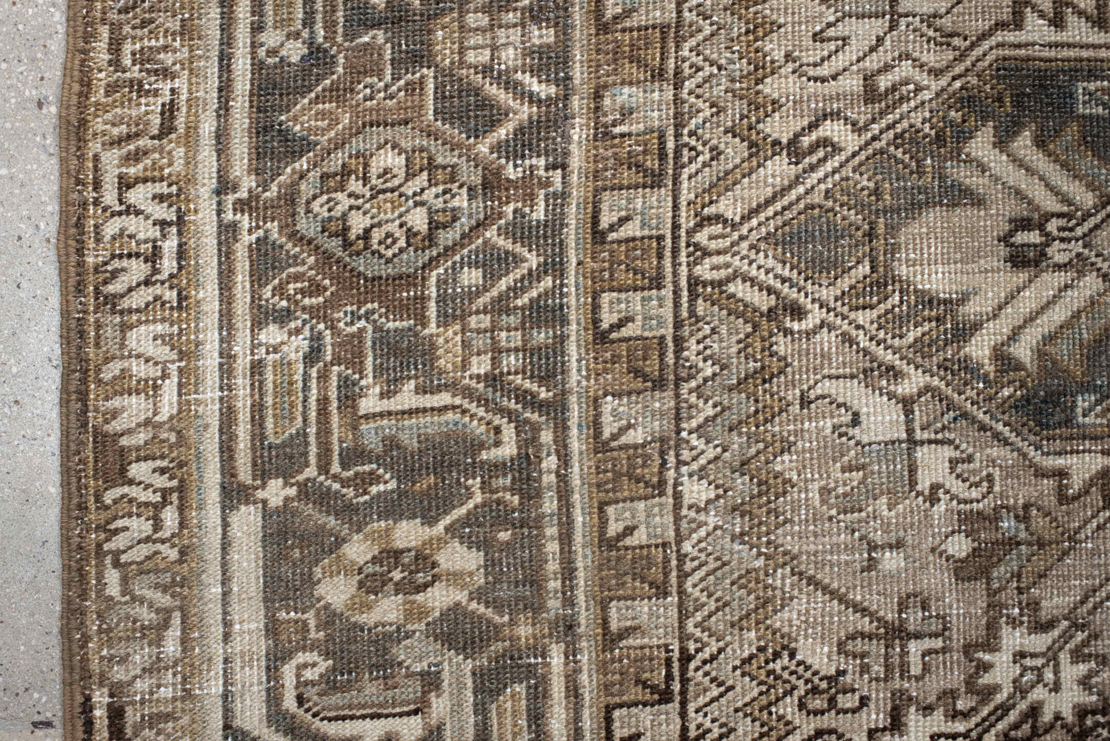 6' x 9' one-of-a-kind handmade antique Heriz rug. Color palette: ivory, taupe, camel, charcoal, brown, sage, beige, gray