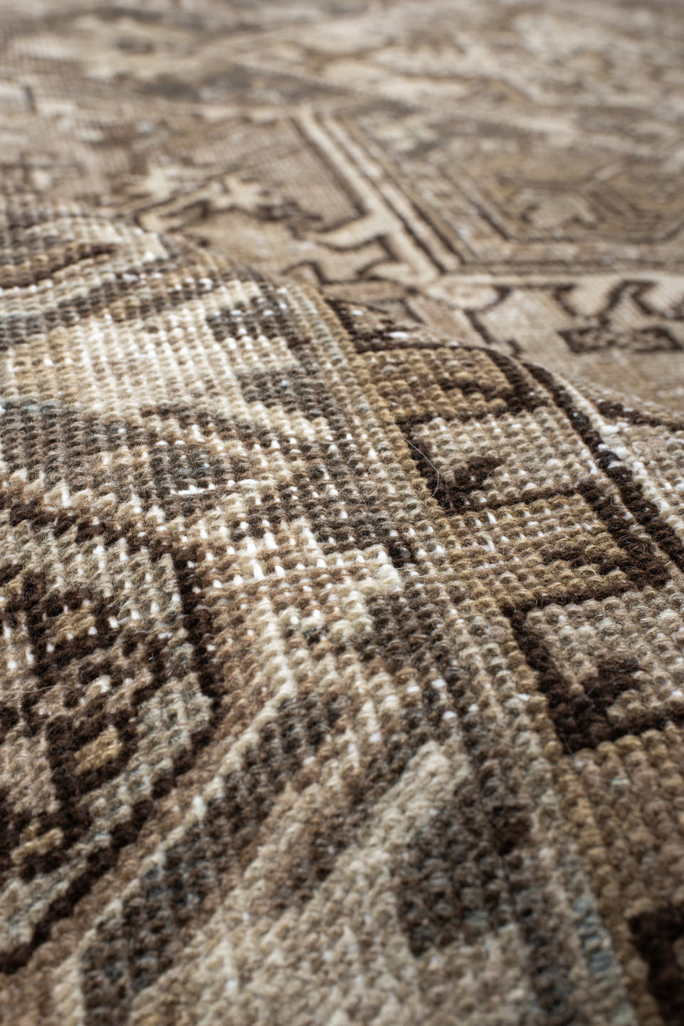6' x 9' one-of-a-kind handmade antique Heriz rug. Color palette: ivory, taupe, camel, charcoal, brown, sage, beige, gray