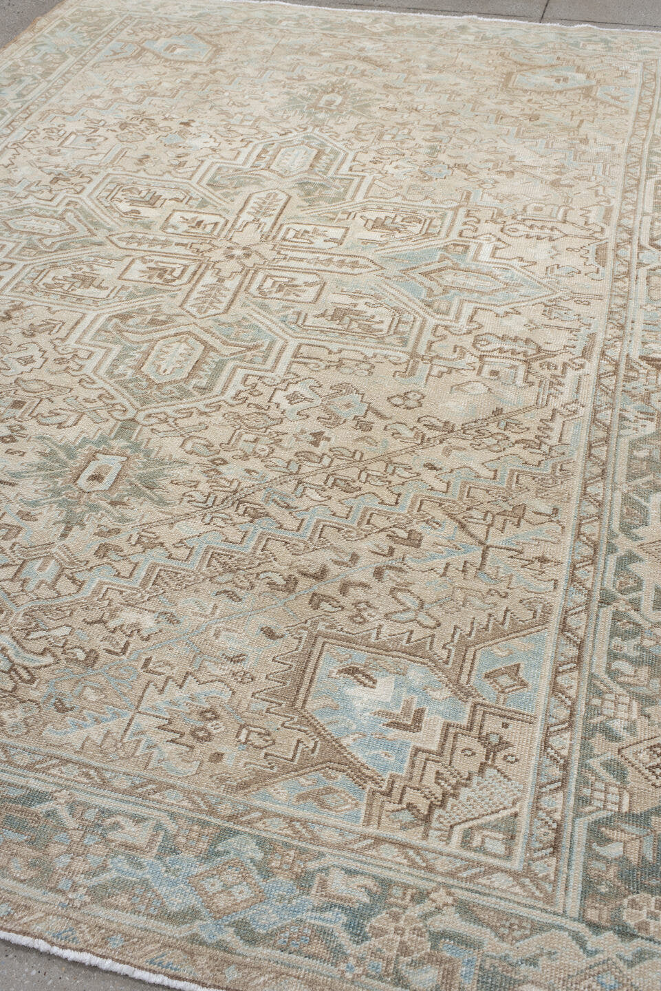 8' x 10' one-of-a-kind handmade antique Heriz large size rug. Color palette: ivory, taupe, pale_blue, sage, beige, camel