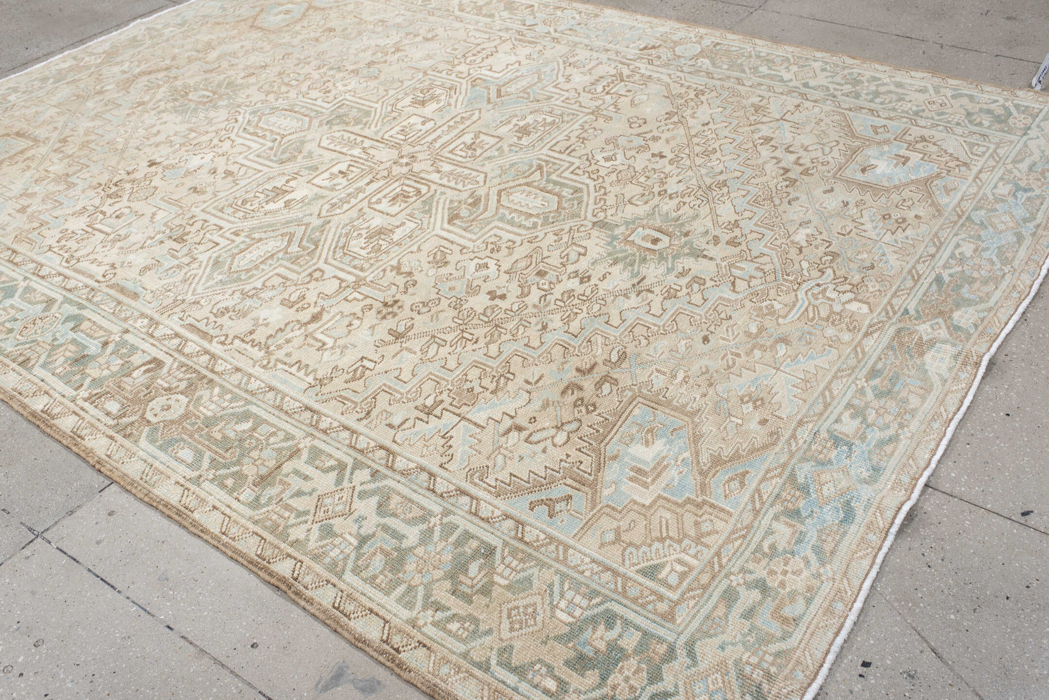 8' x 10' one-of-a-kind handmade antique Heriz large size rug. Color palette: ivory, taupe, pale_blue, sage, beige, camel