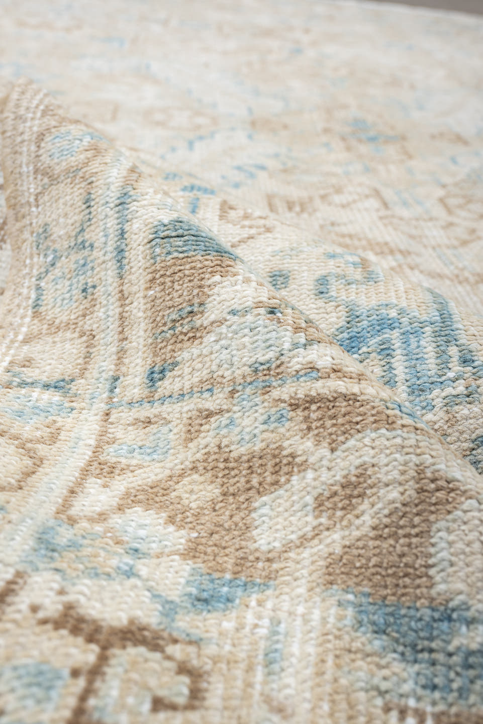 6' x 7' one-of-a-kind handmade vintage Heriz medium size rug. Color palette: ivory, taupe, sky blue, beige, camel
