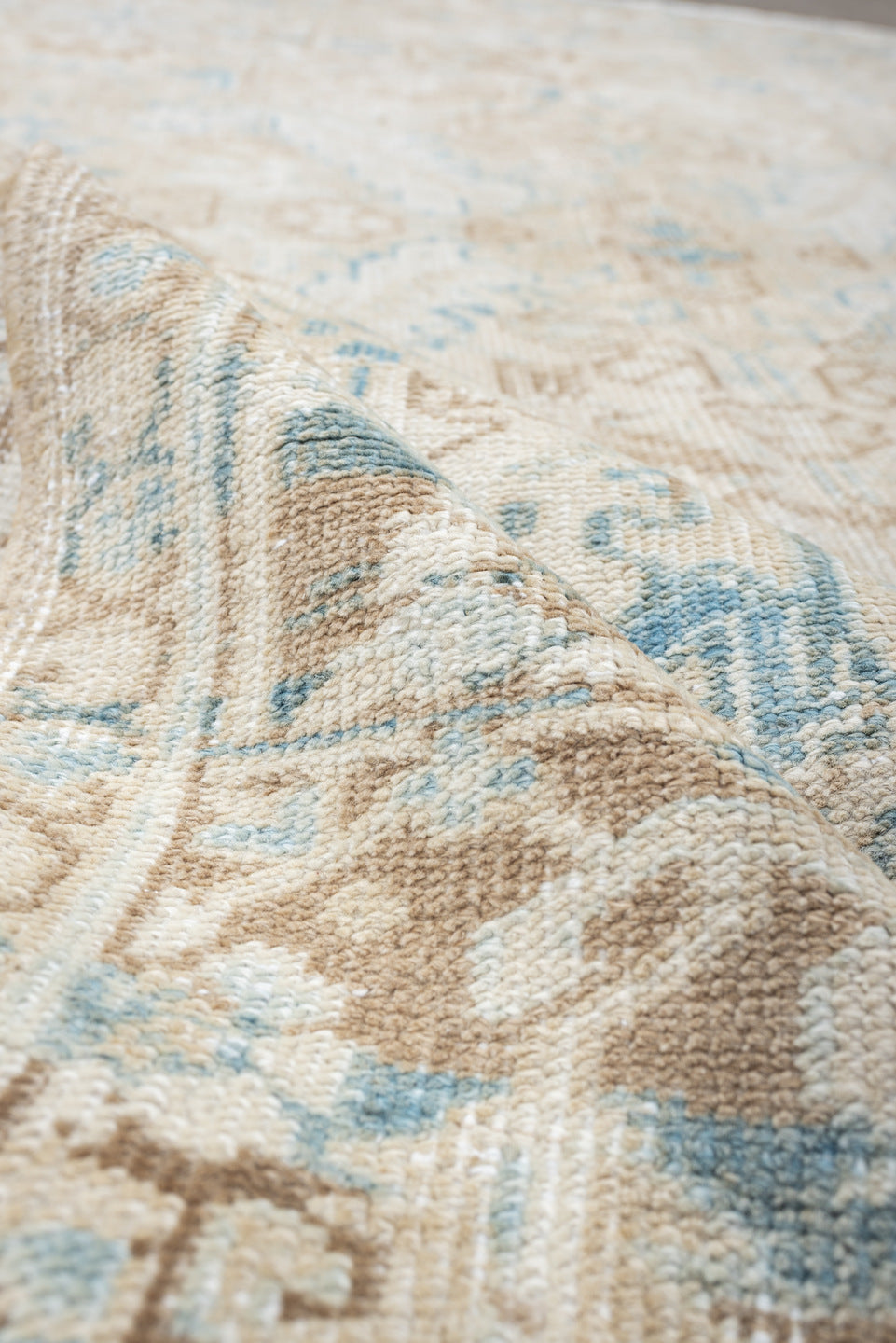 6' x 7' one-of-a-kind handmade vintage Heriz medium size rug. Color palette: ivory, taupe, sky blue, beige, camel