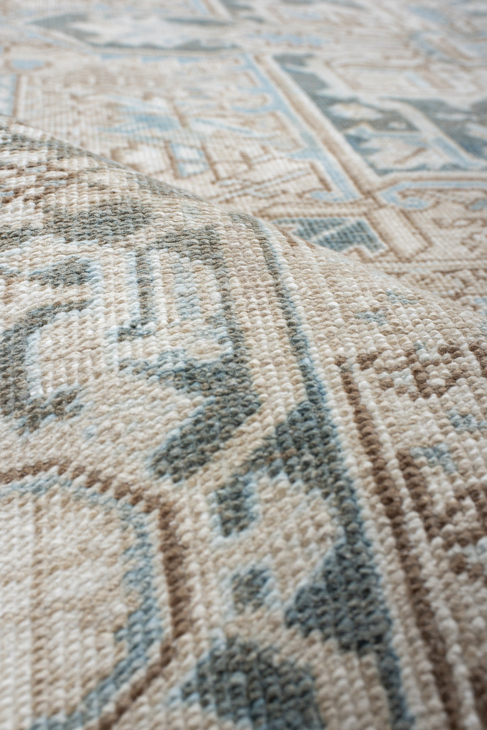 6' x 10' one-of-a-kind handmade antique Heriz large size rug. Color palette: ivory, sky blue, taupe, charcoal, beige, slate