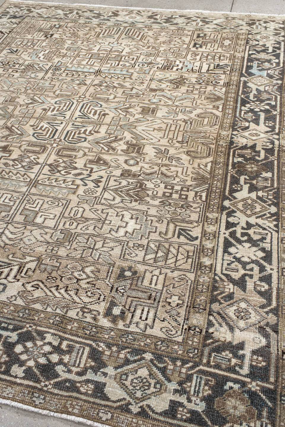 6' x 8' one-of-a-kind handmade antique Heriz medium size rug. Color palette: ivory, taupe, brown, charcoal, camel, slate