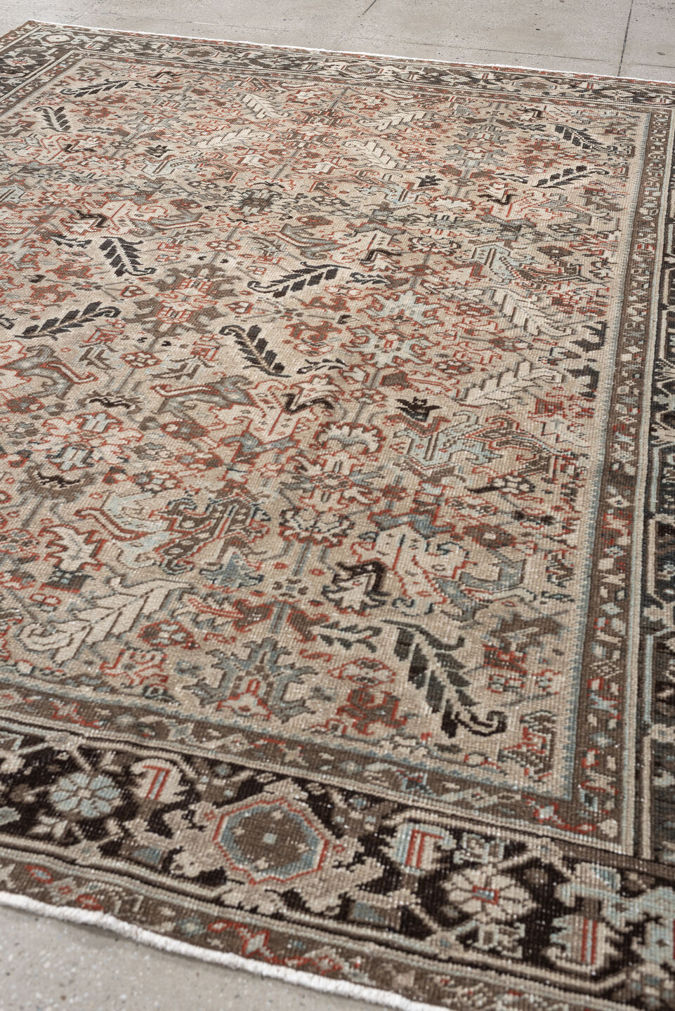 8' x 9' one-of-a-kind handmade vintage rug. Color palette: ivory, charcoal, slate, taupe, terracotta, brown, black, gray