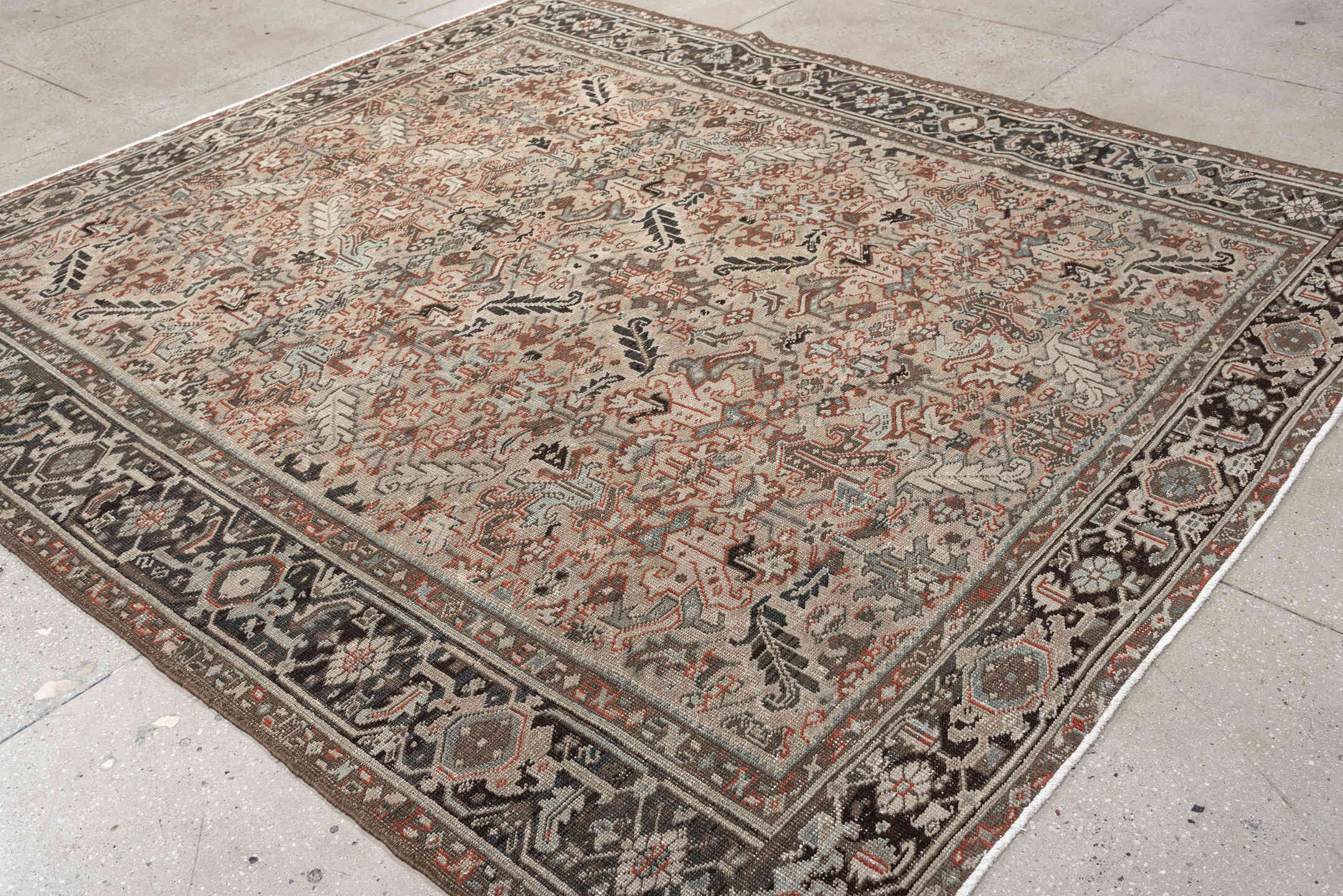 8' x 9' one-of-a-kind handmade vintage rug. Color palette: ivory, charcoal, slate, taupe, terracotta, brown, black, gray