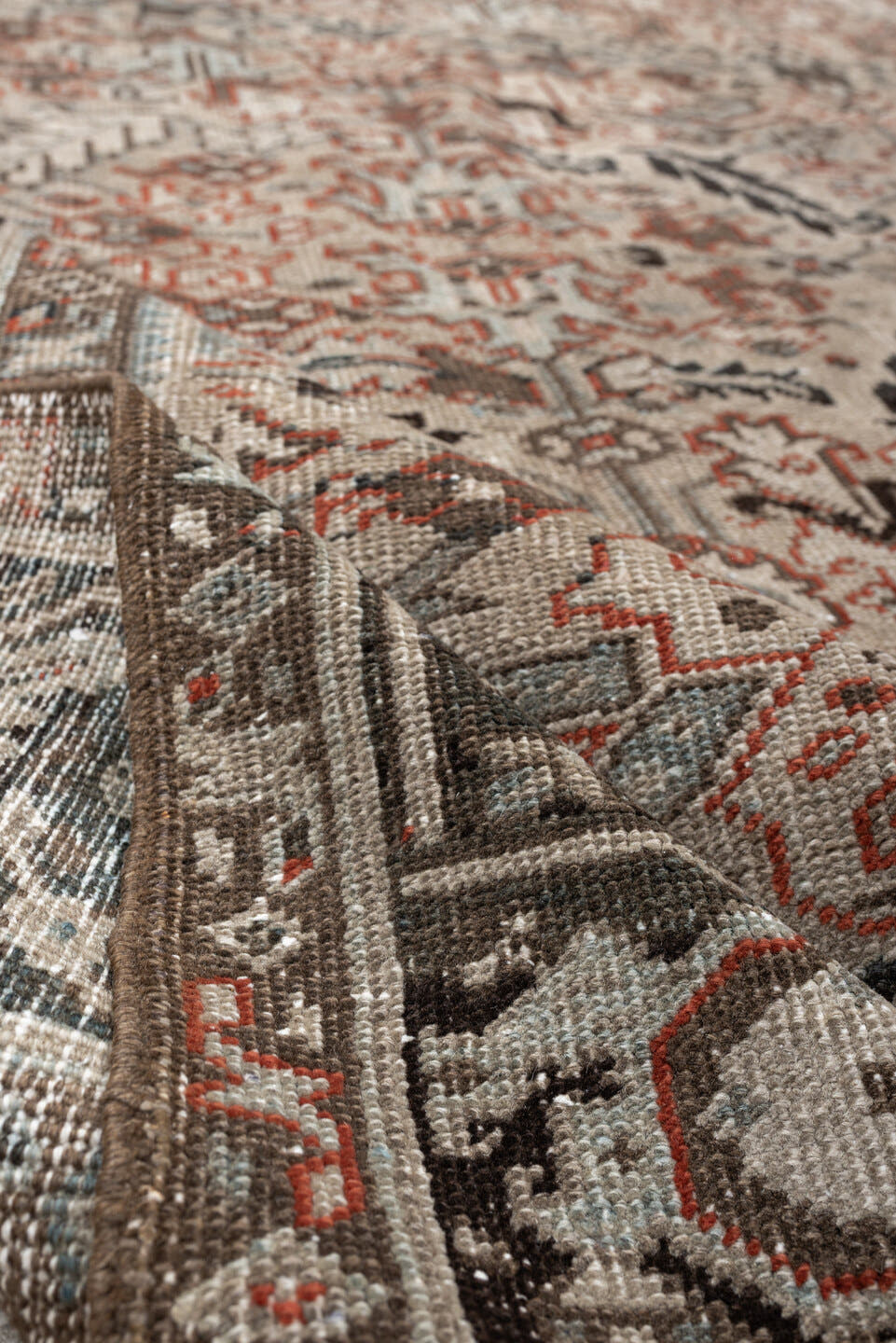 8' x 9' one-of-a-kind handmade vintage rug. Color palette: ivory, charcoal, slate, taupe, terracotta, brown, black, gray