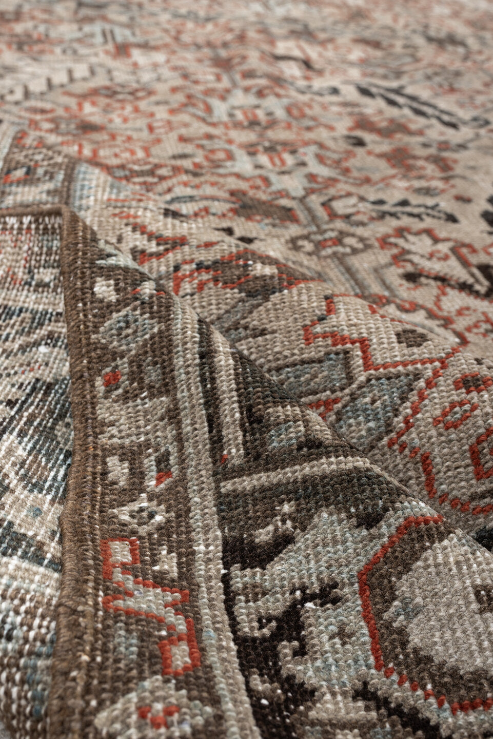8' x 9' one-of-a-kind handmade vintage rug. Color palette: ivory, charcoal, slate, taupe, terracotta, brown, black, gray