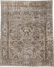7' x 9' one-of-a-kind handmade antique Heriz rug. Color palette: taupe, brown, ivory, beige, pale blue, camel, gray