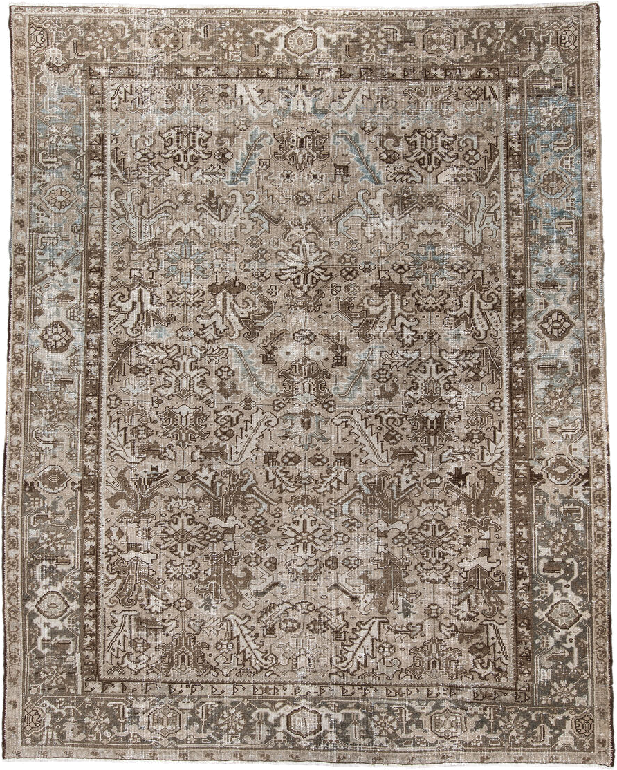 7' x 9' one-of-a-kind handmade antique Heriz rug. Color palette: taupe, brown, ivory, beige, pale blue, camel, gray