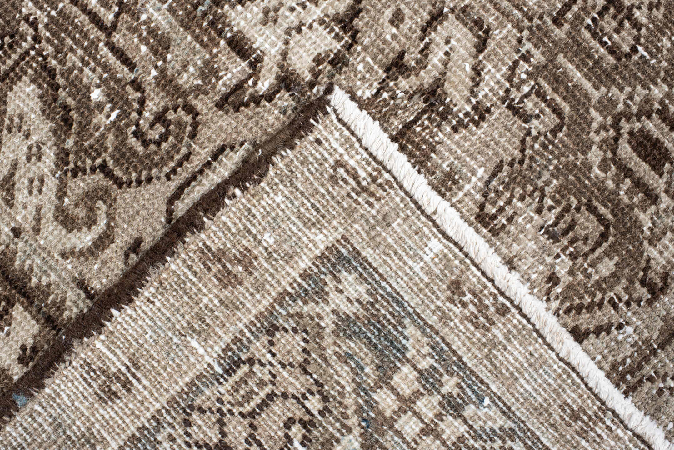 7' x 9' one-of-a-kind handmade antique Heriz rug. Color palette: taupe, brown, ivory, beige, pale blue, camel, gray
