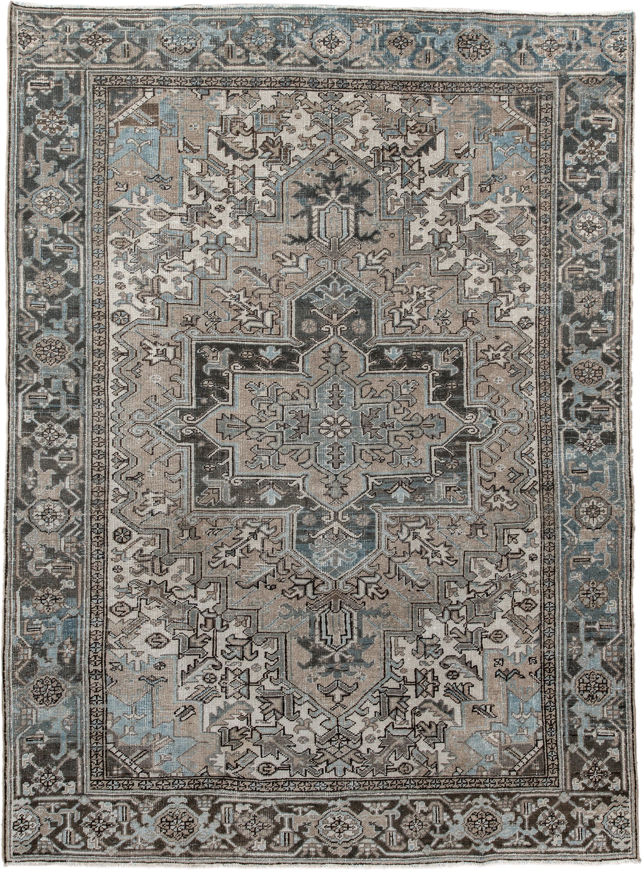 6' x 9' one-of-a-kind handmade antique Heriz medium size rug. Color palette: taupe, sky blue, charcoal, ivory, slate, brown