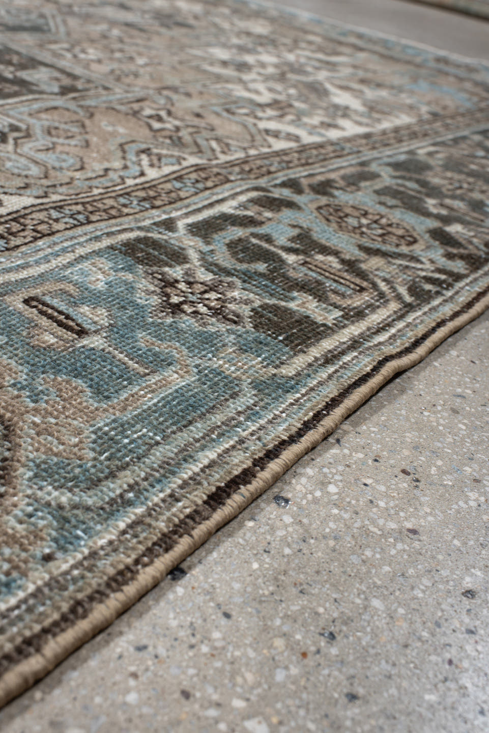 6' x 9' one-of-a-kind handmade antique Heriz medium size rug. Color palette: taupe, sky blue, charcoal, ivory, slate, brown