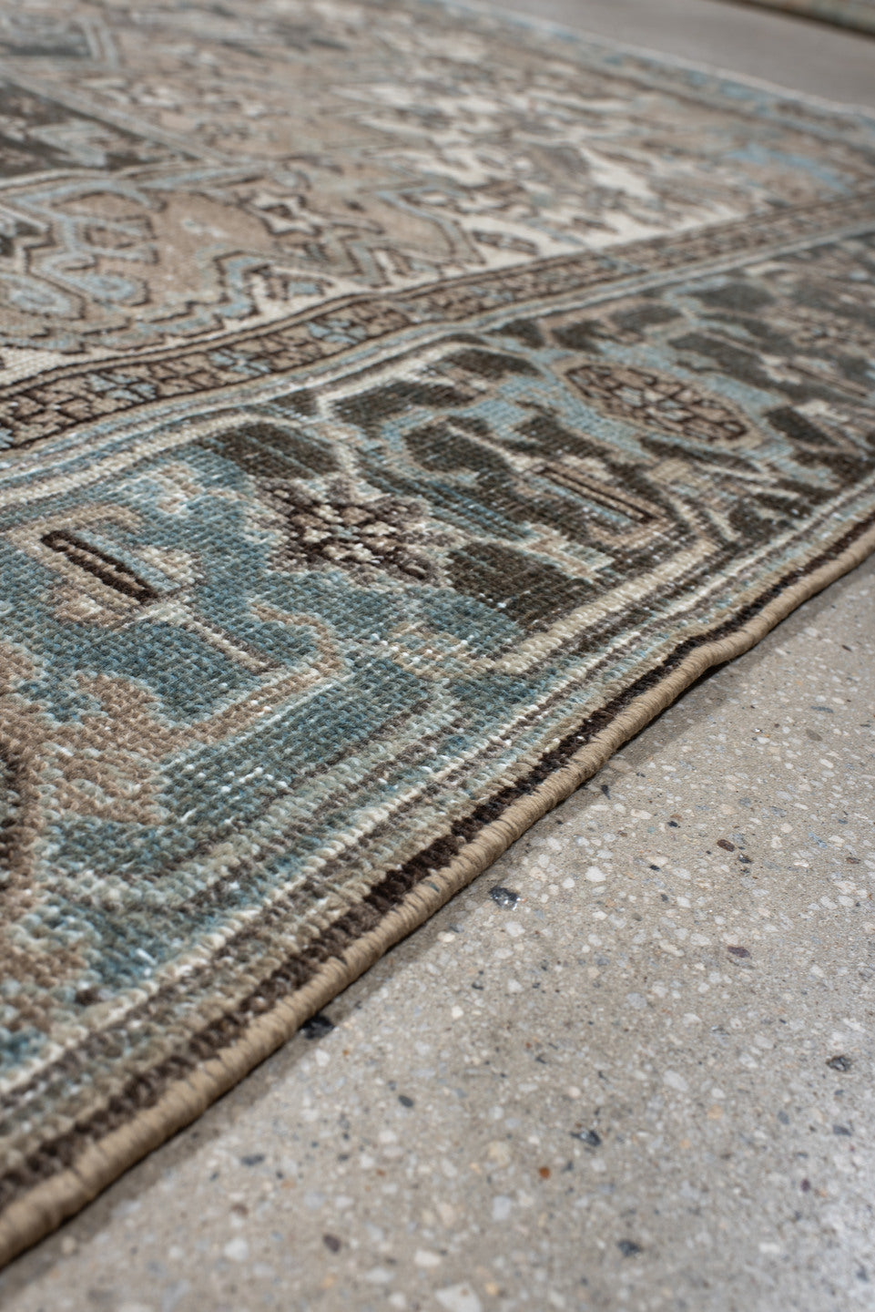 6' x 9' one-of-a-kind handmade antique Heriz medium size rug. Color palette: taupe, sky blue, charcoal, ivory, slate, brown