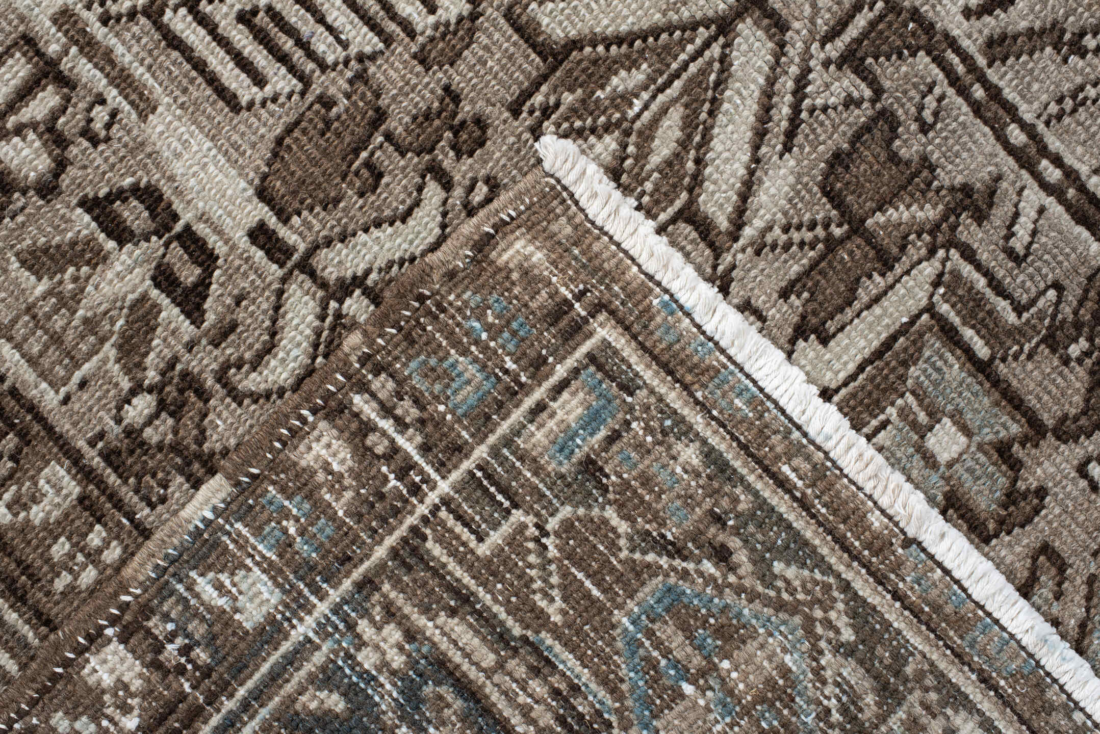 7' x 7' one-of-a-kind handmade antique Heriz rug. Color palette: taupe, brown, ivory, gray, charcoal, beige, black