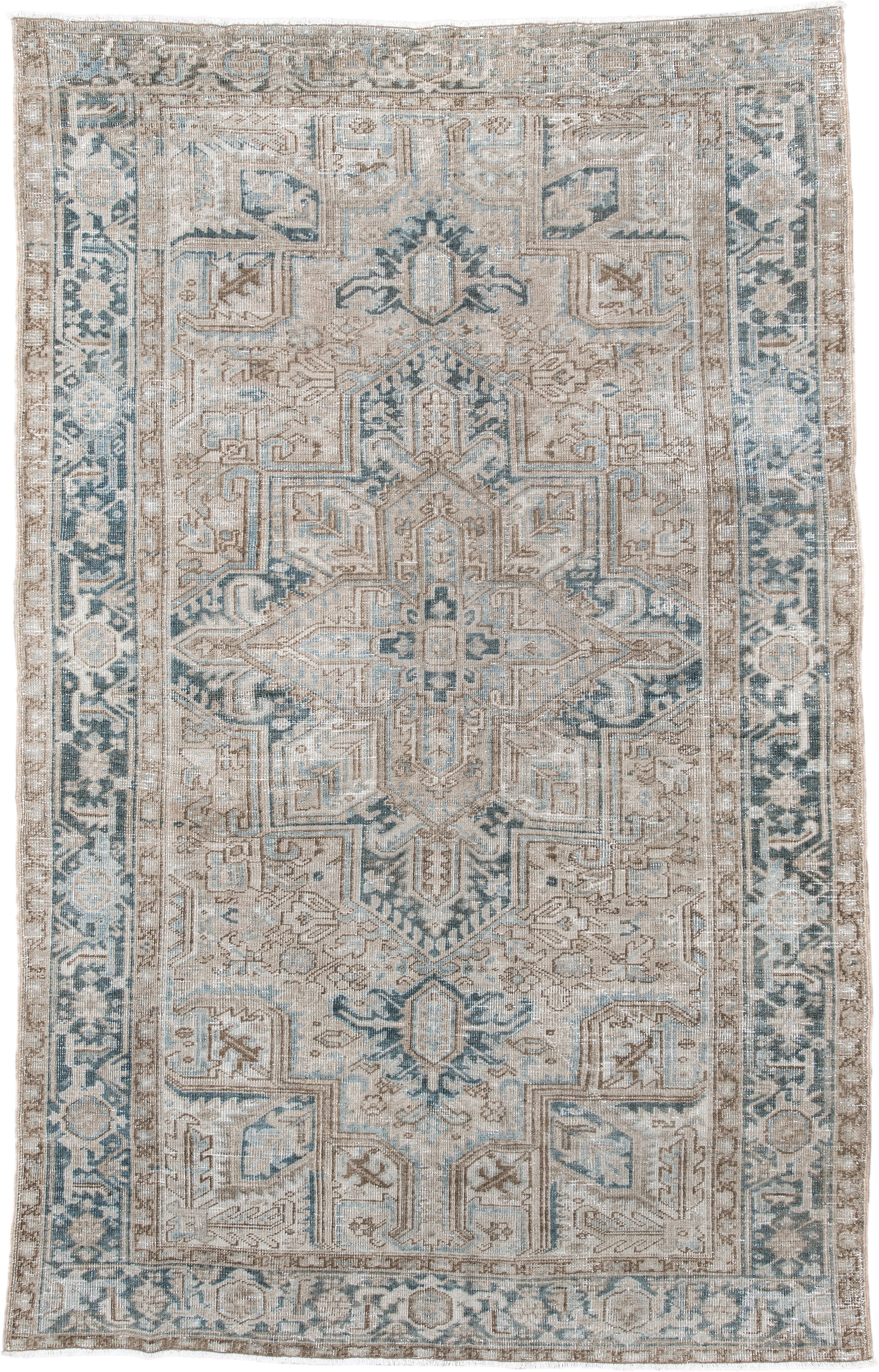 6' x 9' one-of-a-kind handmade antique Heriz medium size rug. Color palette: ivory, taupe, pale blue, beige, slate, cream