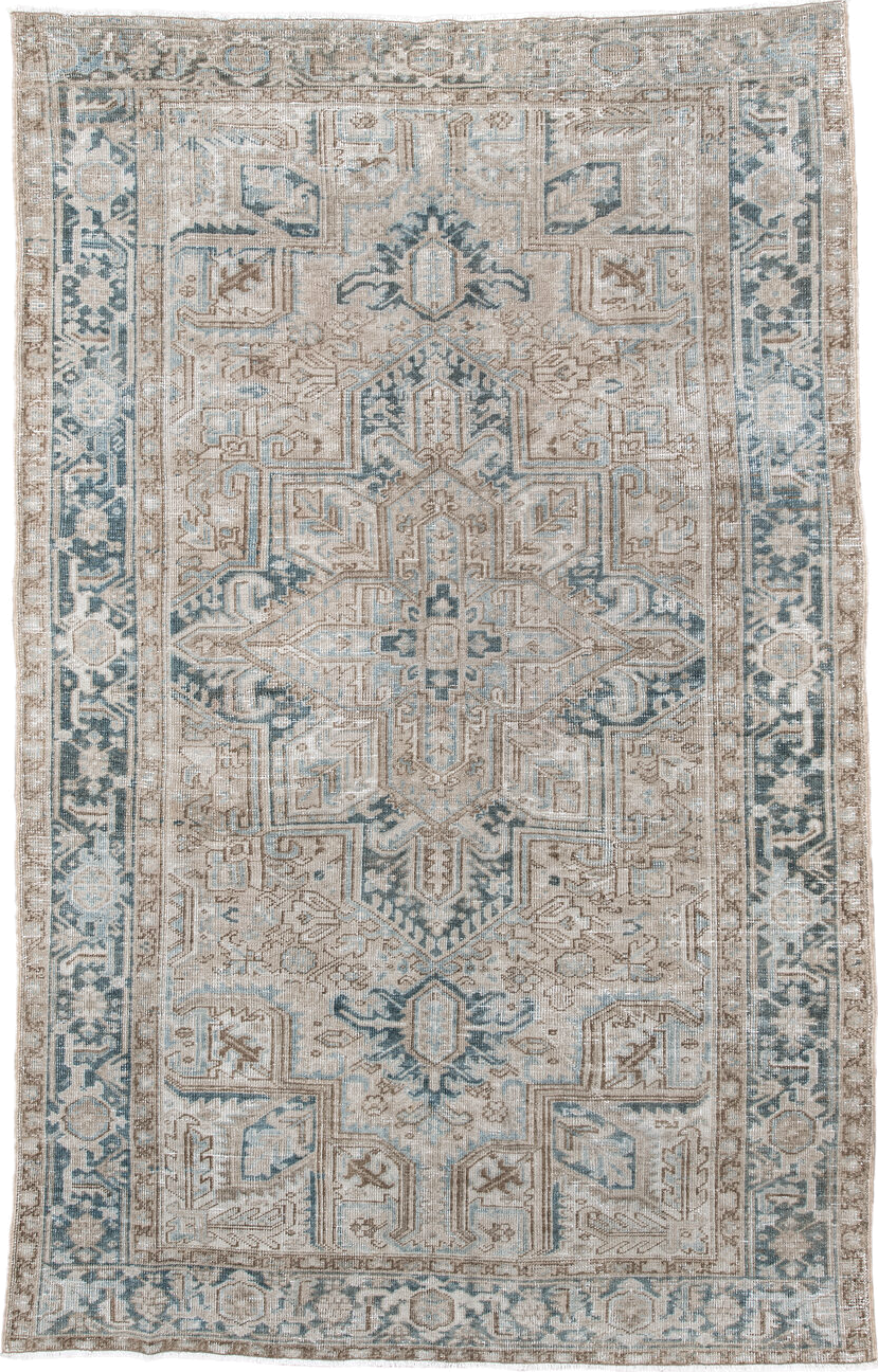 6' x 9' one-of-a-kind handmade antique Heriz medium size rug. Color palette: ivory, taupe, pale blue, beige, slate, cream