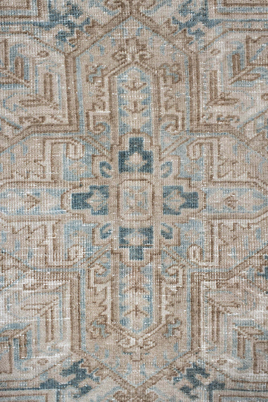 6' x 9' one-of-a-kind handmade antique Heriz medium size rug. Color palette: ivory, taupe, pale blue, beige, slate, cream