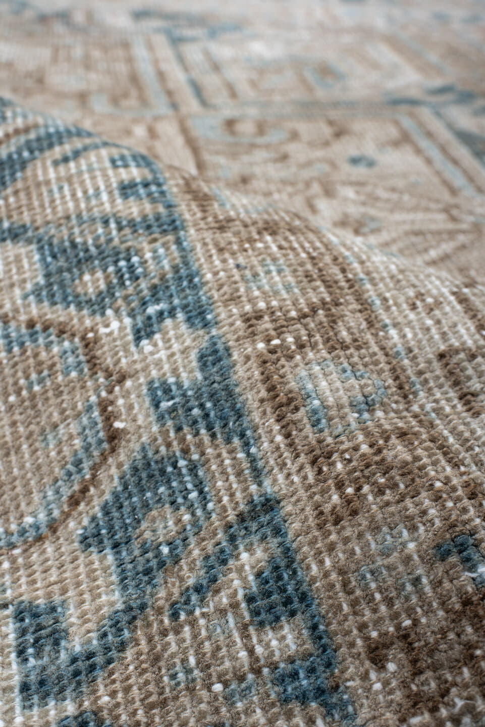6' x 9' one-of-a-kind handmade antique Heriz medium size rug. Color palette: ivory, taupe, pale blue, beige, slate, cream