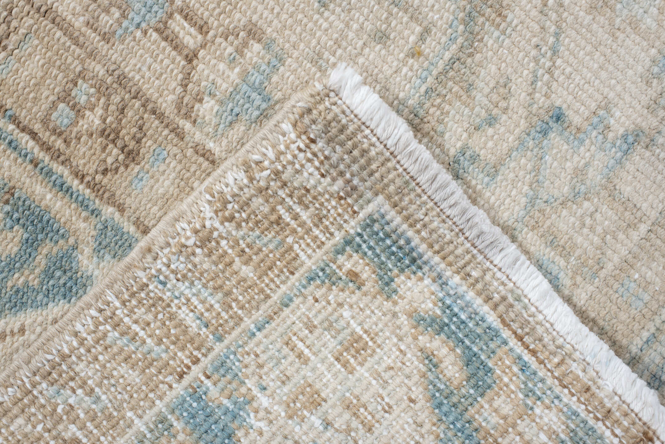 7' x 9' one-of-a-kind handmade antique Heriz large size rug. Color palette: ivory, sky blue, beige, taupe, camel, light blue