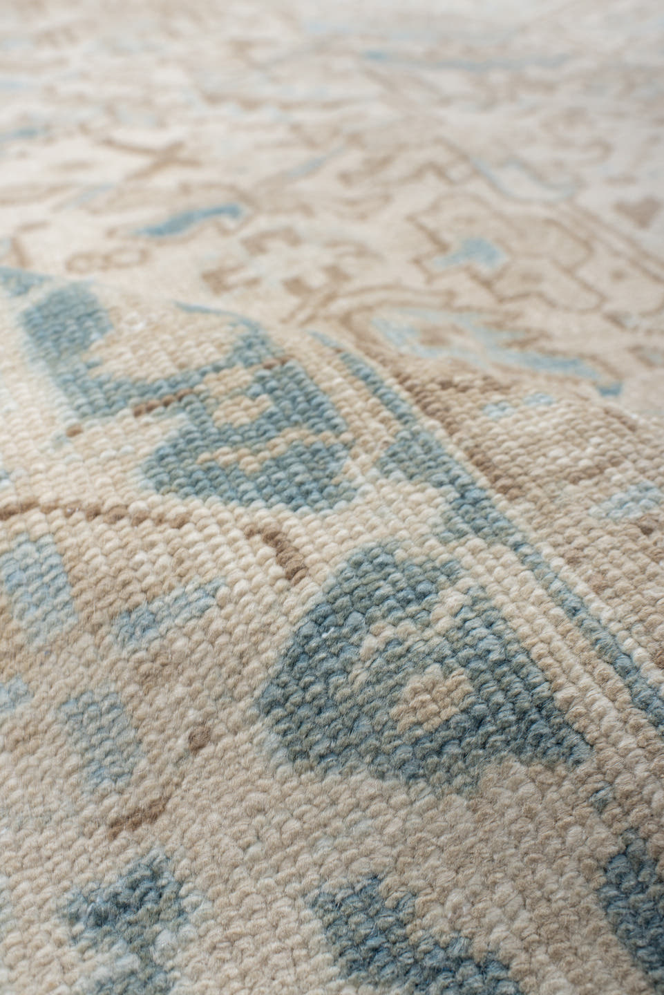 7' x 9' one-of-a-kind handmade antique Heriz large size rug. Color palette: ivory, sky blue, beige, taupe, camel, light blue