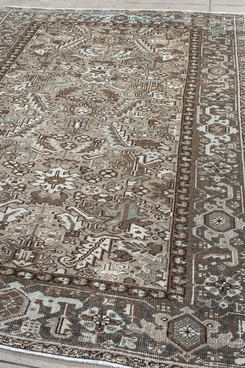 6' x 8' one-of-a-kind handmade vintage Heriz medium size rug. Color palette: black, brown, charcoal, dark gray, floral white