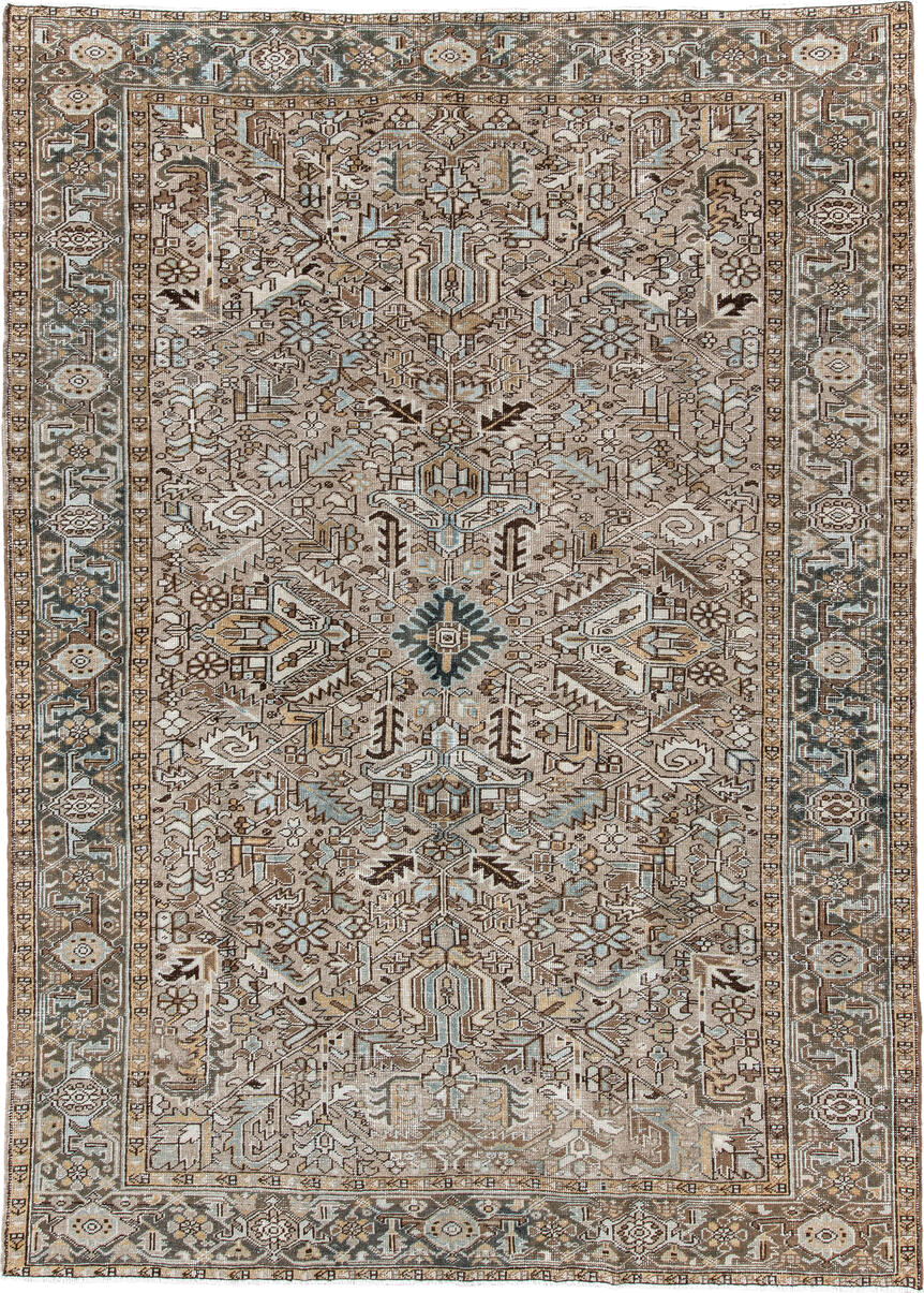 7' x 10' one-of-a-kind handmade antique Heriz large size rug. Color palette: taupe, ivory, slate, camel, brown, pale blue