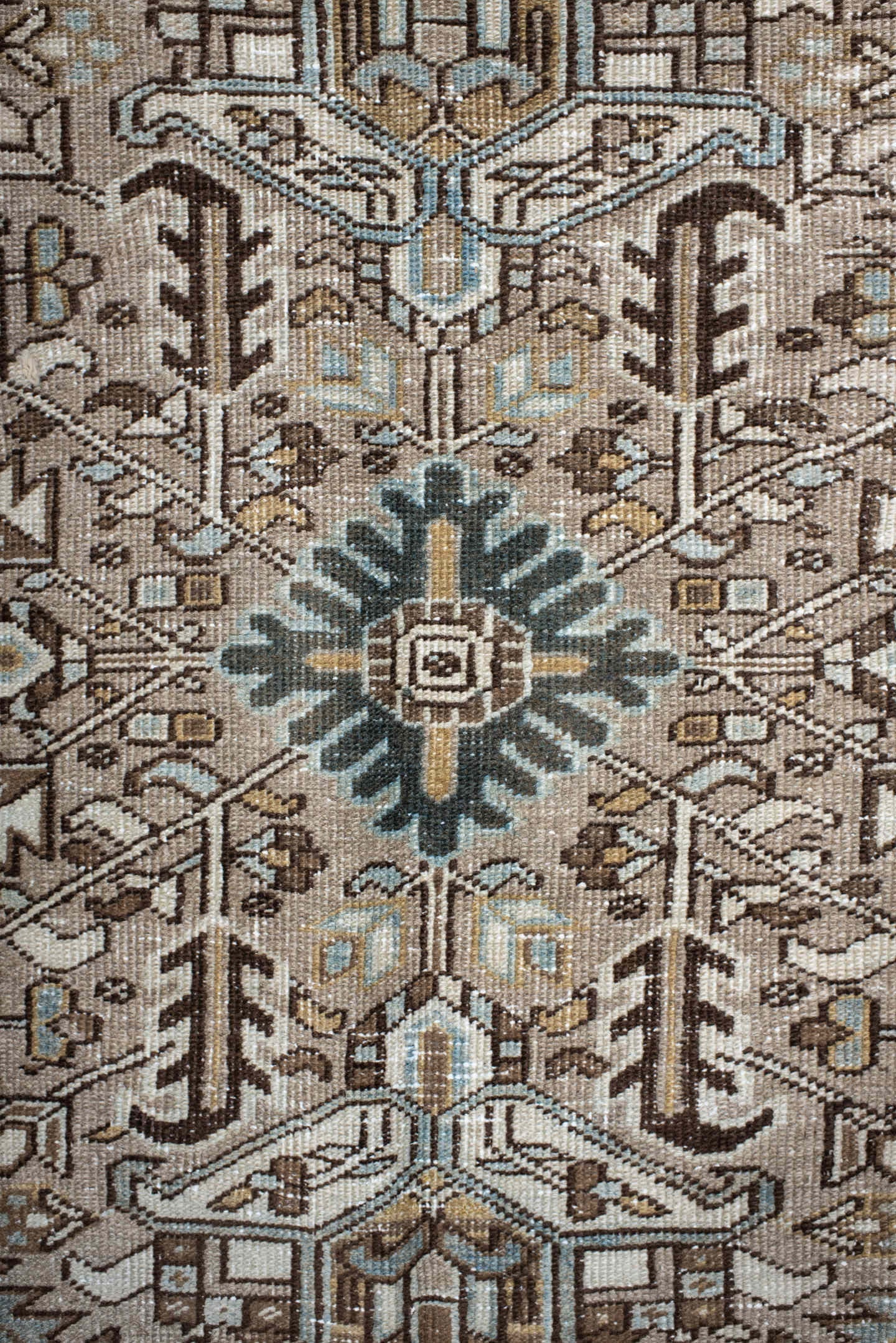 7' x 10' one-of-a-kind handmade antique Heriz large size rug. Color palette: taupe, ivory, slate, camel, brown, pale blue