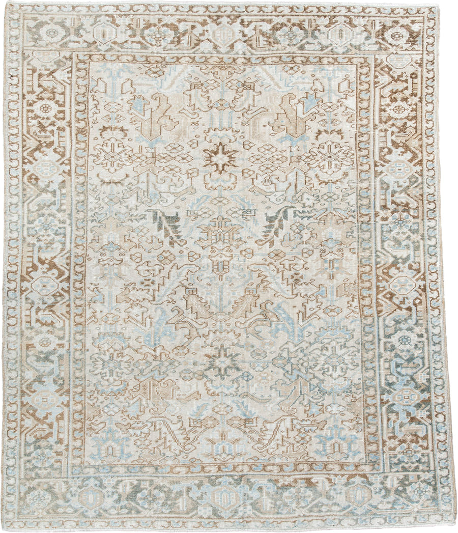 7' x 8' one-of-a-kind handmade antique Heriz rug. Color palette: ivory, camel, pale blue, taupe, light gray, sand, beige