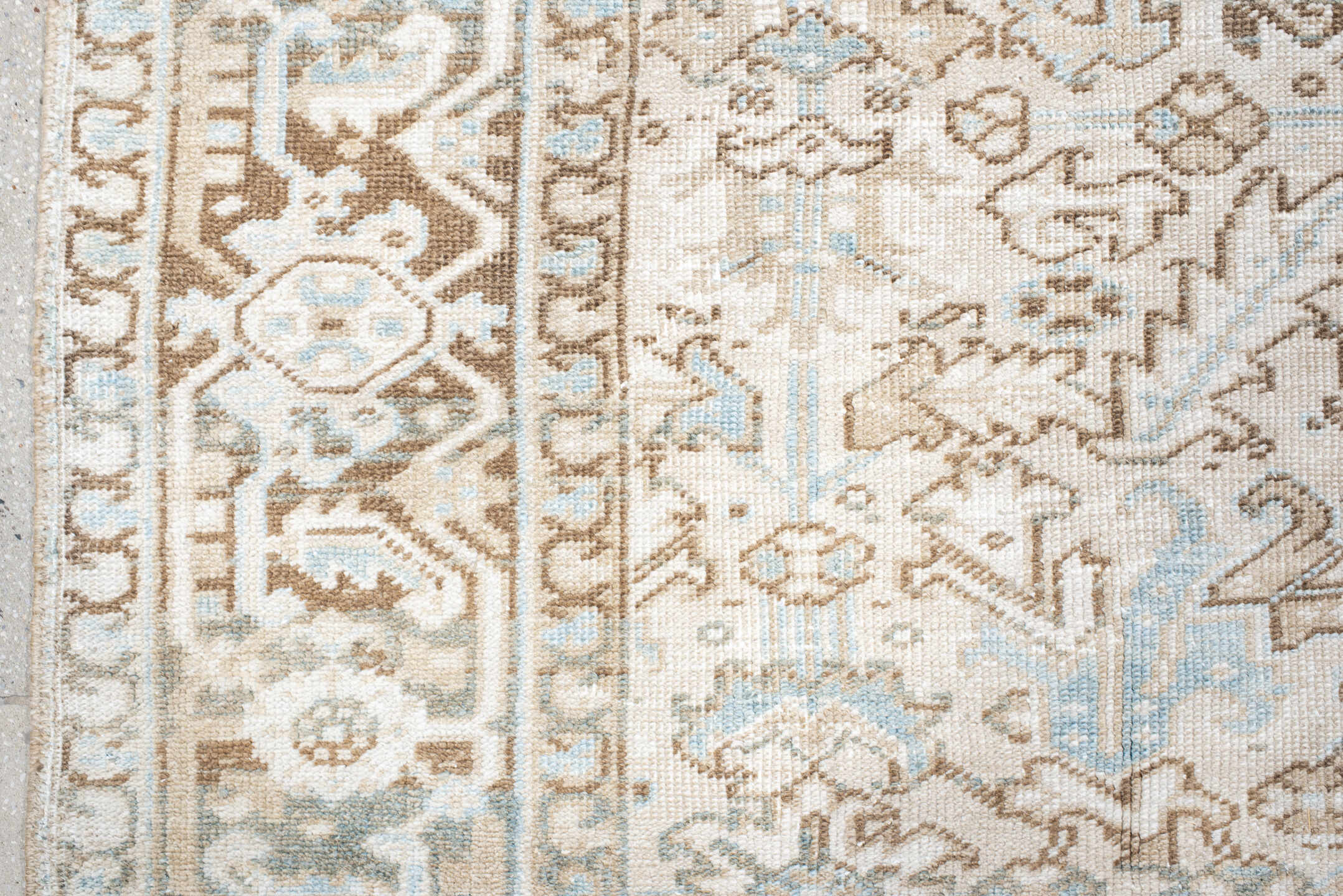 7' x 8' one-of-a-kind handmade antique Heriz rug. Color palette: ivory, camel, pale blue, taupe, light gray, sand, beige