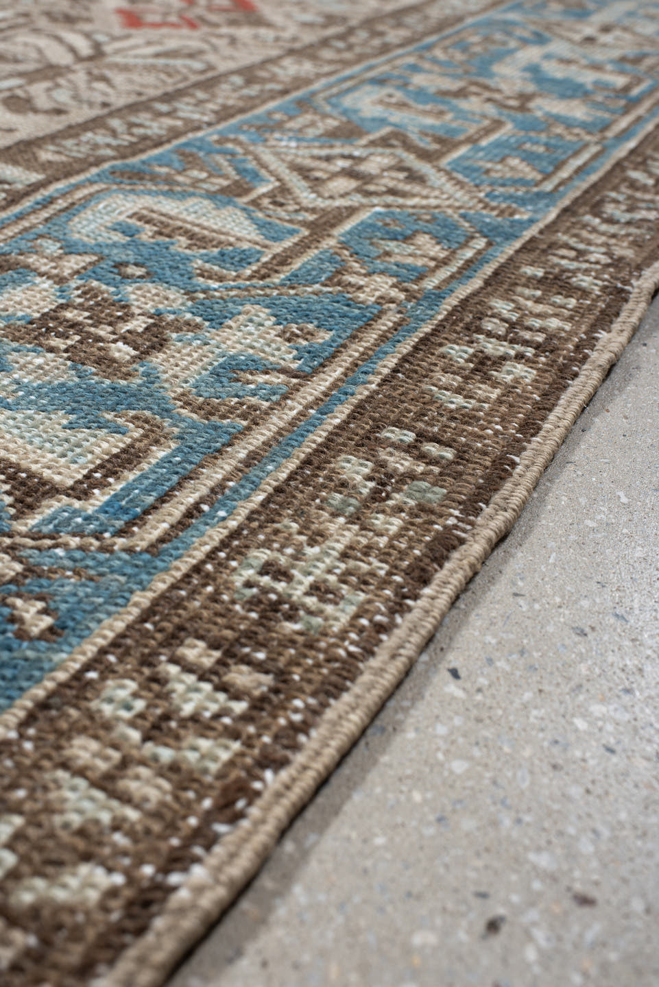 6' x 9' one-of-a-kind handmade antique Heriz medium size rug. Color palette: ivory, sky_blue, taupe, brown, rust, camel
