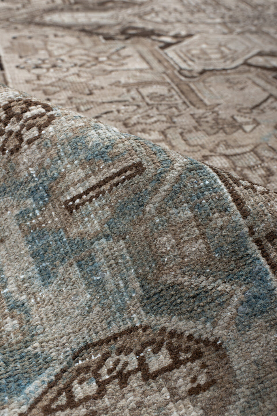 6' x 9' one-of-a-kind handmade vintage Heriz medium size rug. Color palette: taupe, ivory, light blue, charcoal, brown